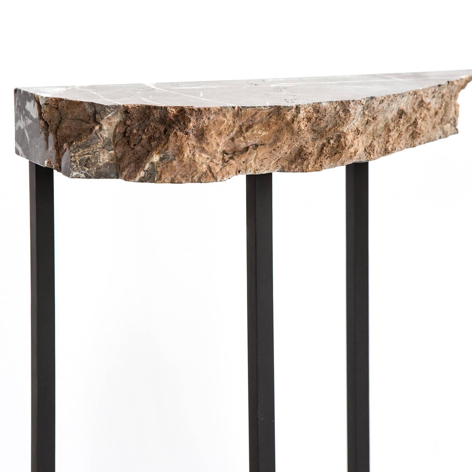 marble and black console table