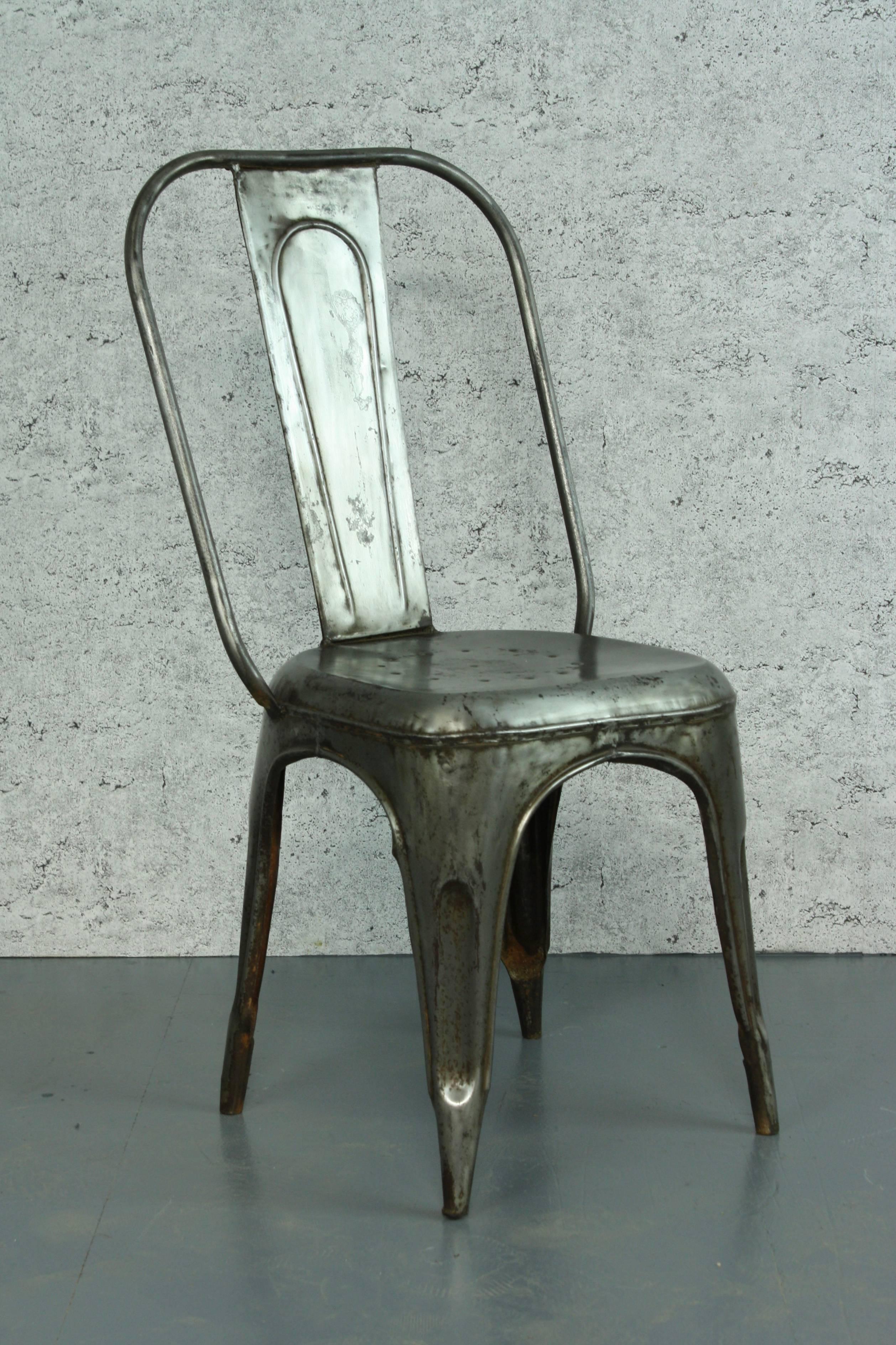 AC chair designed by Xavier Pauchard in 1934, manufactured early 21st century. Galvanised steel, so suitable for outdoor use. 

Its been stripped, polished and waxed.

These chairs are stackable. 

An indestructible design Classic.

We have