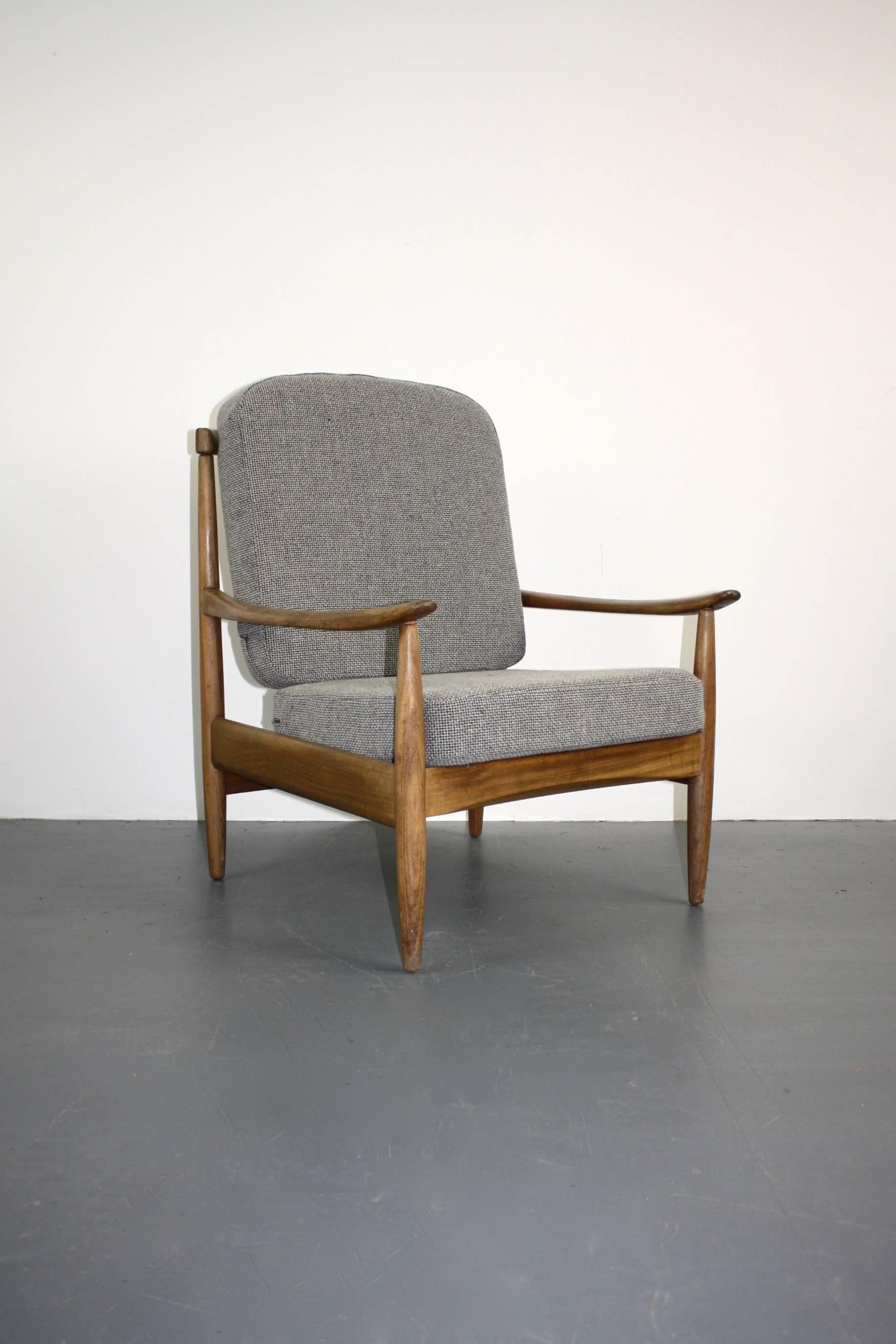 Midcentury Danish design teak lounge chair. Lovely patina to the wood and a finely made piece.

Newly upholstered in a Romo fabric, with new seat webbing.

Condition-wise, there are some small signs of wear, commensurate with age, nothing major