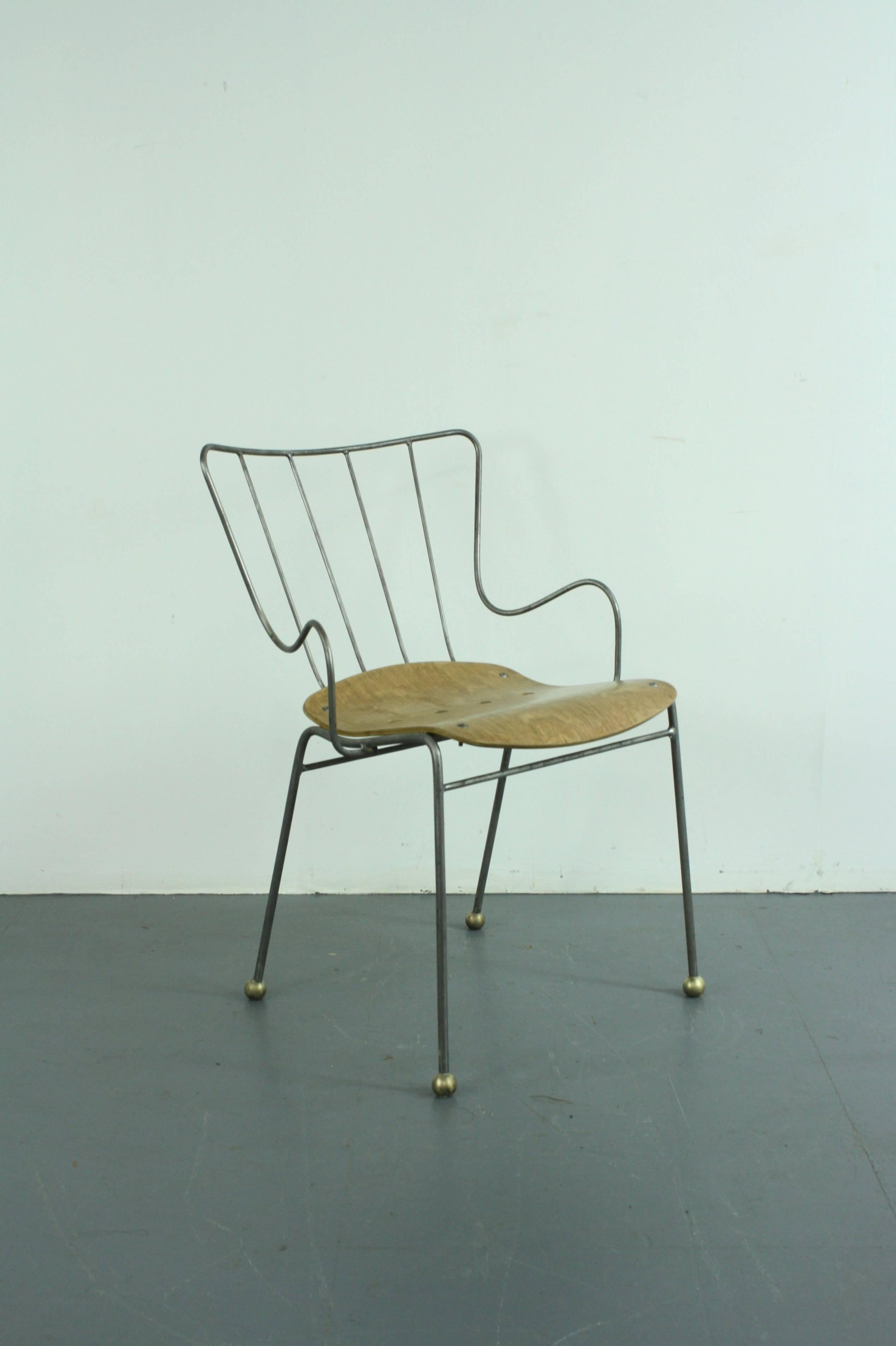 1950s Antelope chair designed by Ernest Race. Bent steel rod frame and moulded plywood seat. 

In good vintage condition. The frame and seat have been stripped and polished.

The Antelope chair was designed for the 1951 Festival of Britain,