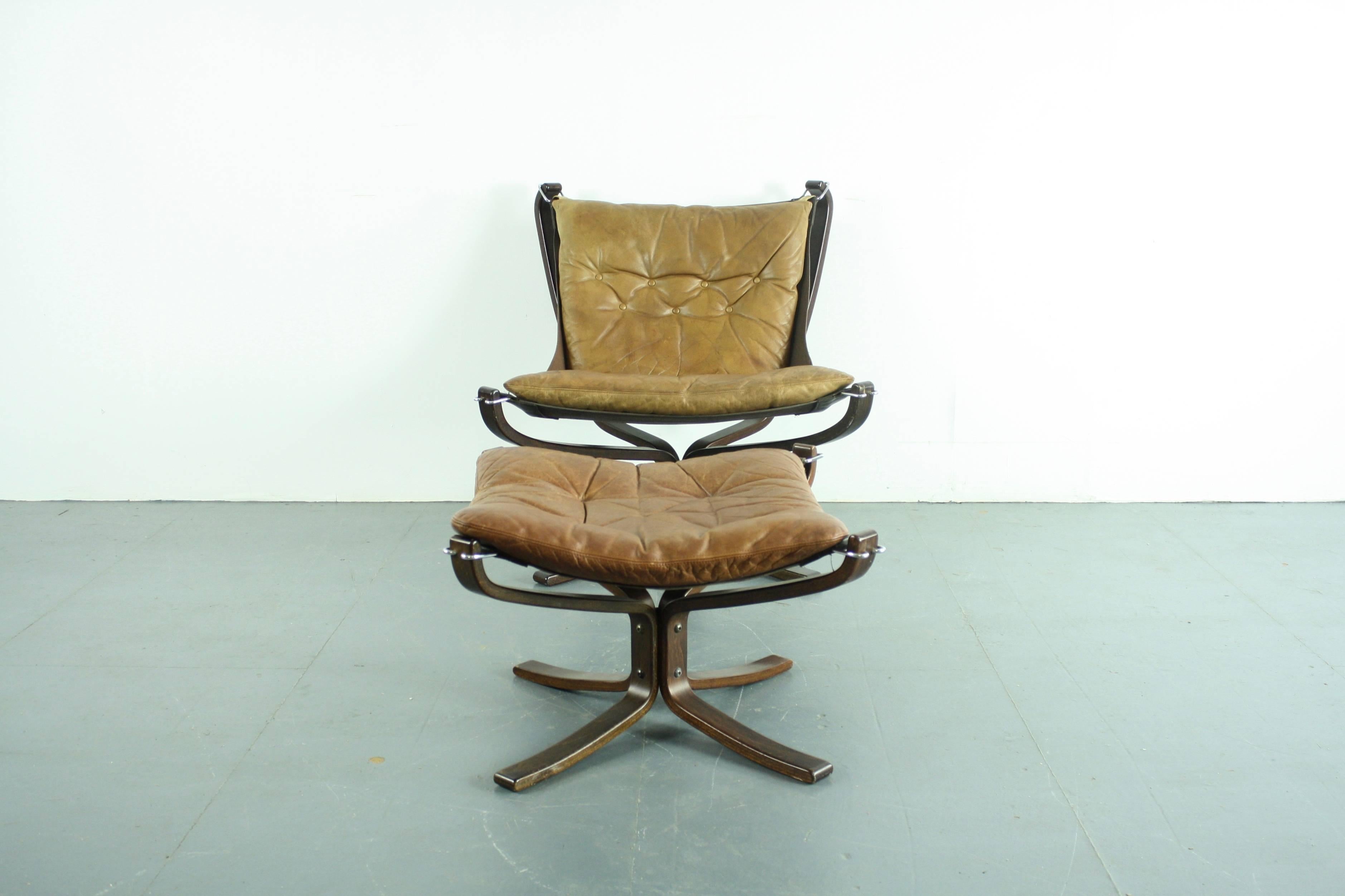 Norwegian Vintage 1970s Low Back Camel Leather Falcon Chair and Ottoman by Sigurd Resell For Sale