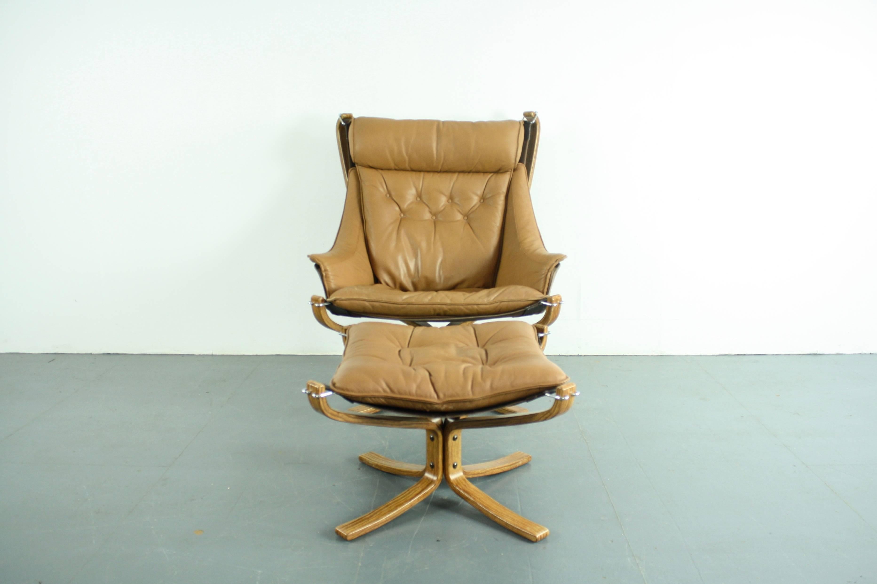 Danish Vintage Camel Leather Rosewood Framed High Backed Winged Falcon Chair & Ottoman For Sale