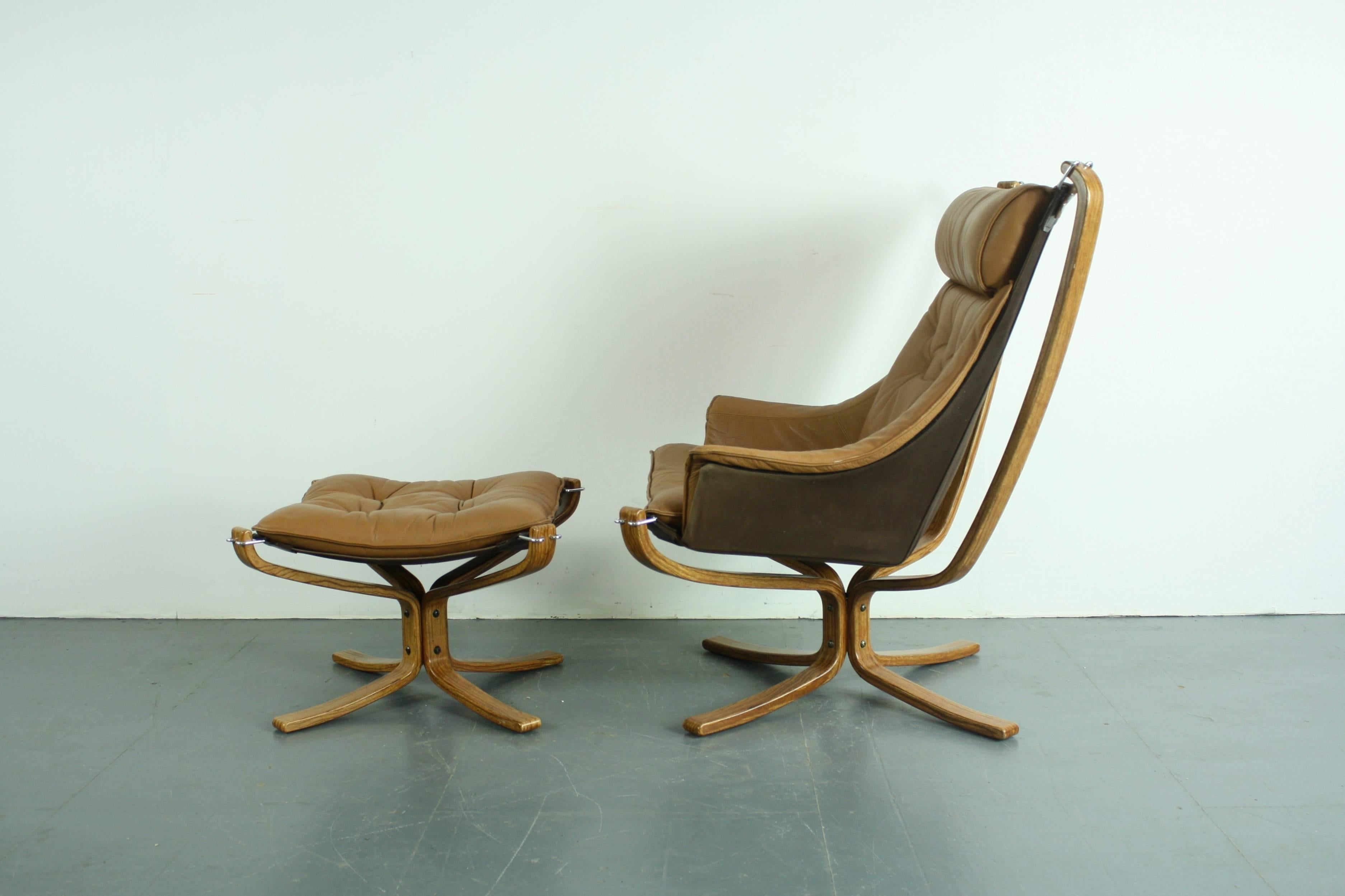 20th Century Vintage Camel Leather Rosewood Framed High Backed Winged Falcon Chair & Ottoman For Sale
