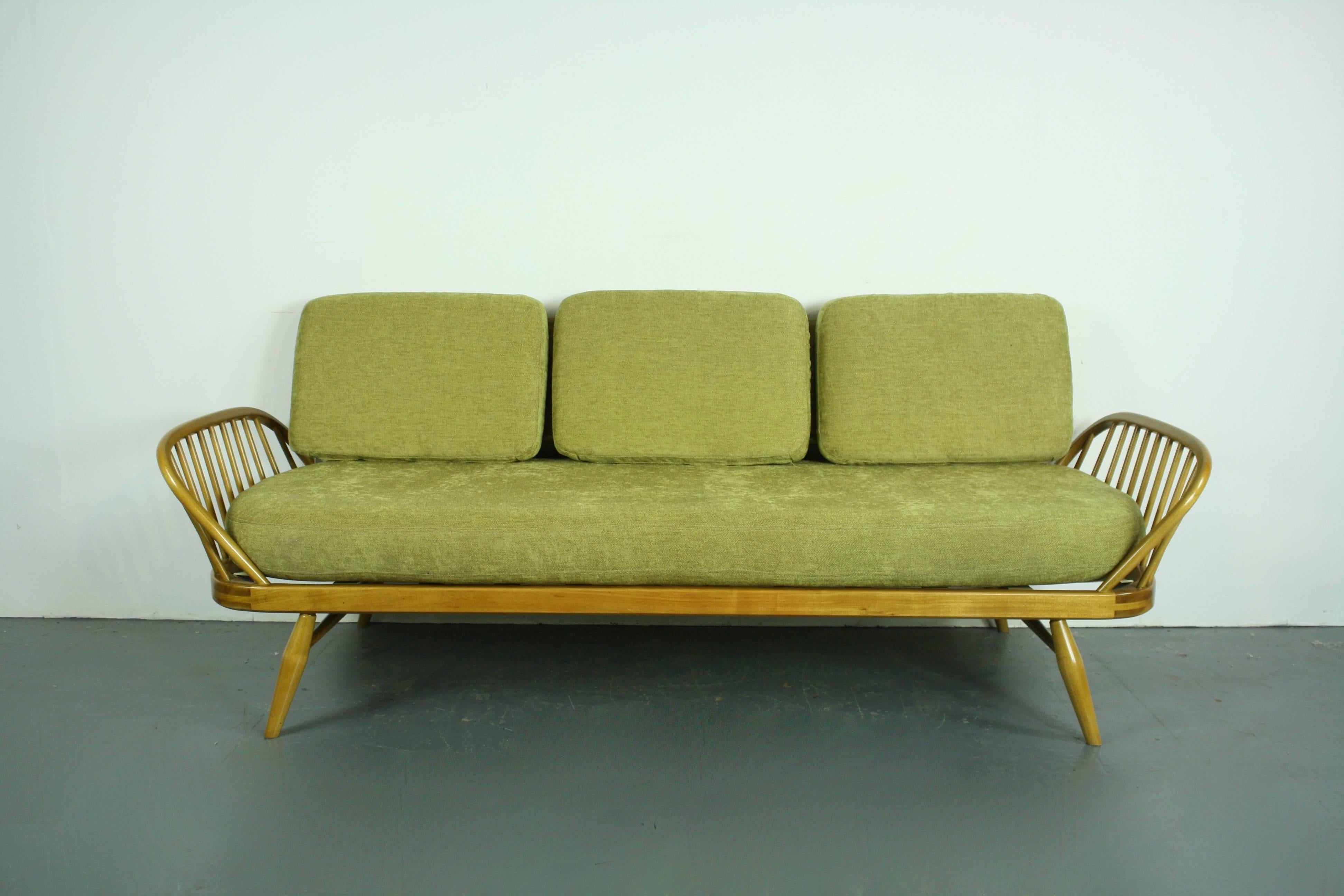 Refurbished vintage Ercol 355 Studio Couch/sofa bed.

Inspired by Scandinavian design, the Studio Couch was designed by Lucian Ercolani in 1958 and manufactured by Ercol in the 1960s/70s. 

This is the much sought after blonde (beech)