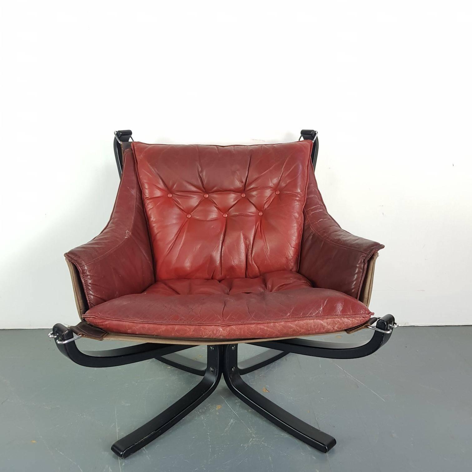 Norwegian Low Back Winged Chestnut Brown Leather Falcon Chair Designed by Sigurd Resell For Sale