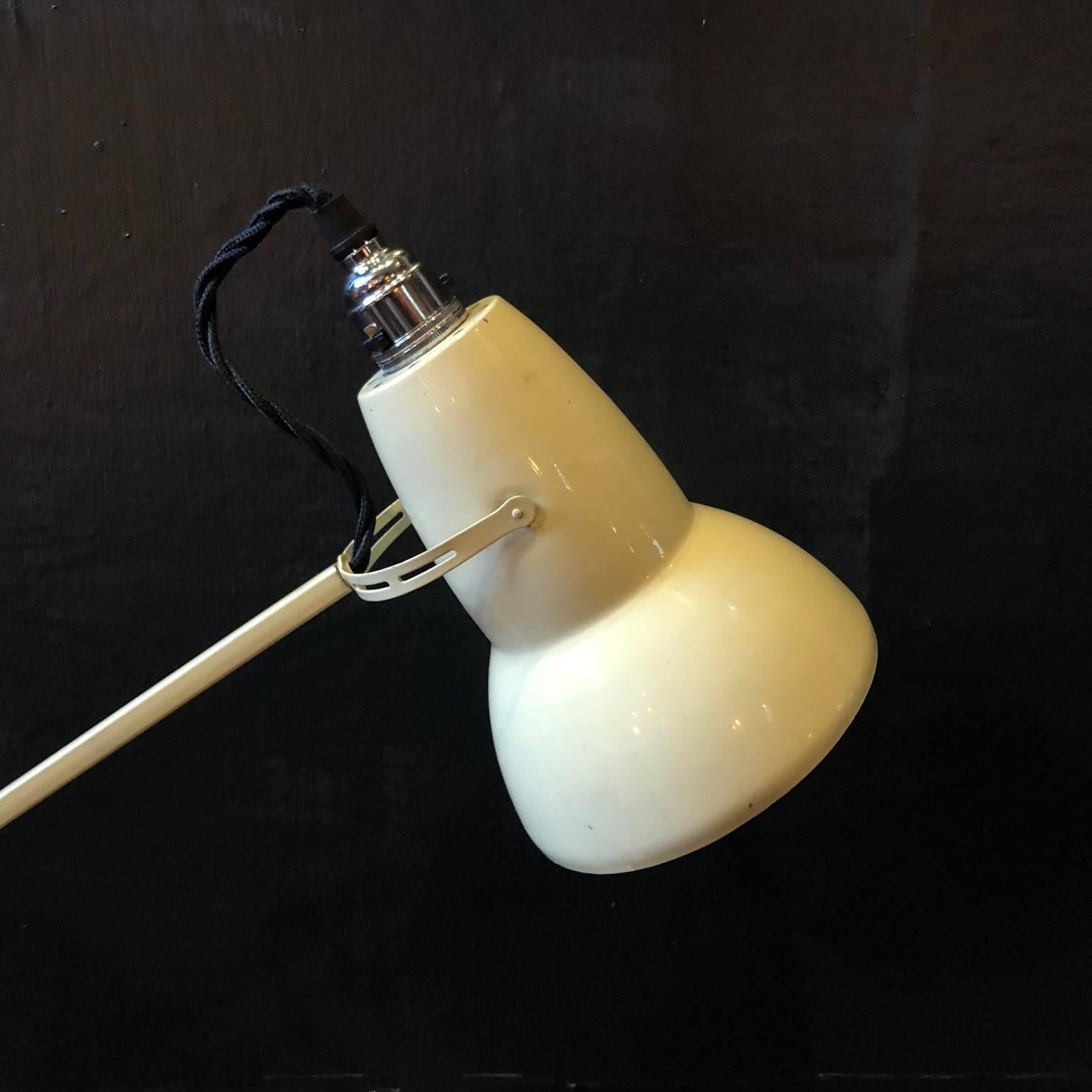 Designed by George Carwardine for Herbert Terry & Sons and made in Redditch, England, this is a lovely example of an original 1930s designed Anglepoise lamp.

This is the later (1960s) model with tulip shade, two-stepped base and adjustable