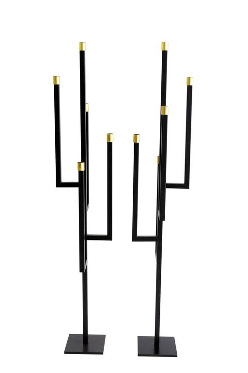 The “Tusk” Candelabras are from the 2016 collection of Alex Drew & No One. Inspired by traditional craftsmanship while incorporating a modern edge, AD&NO's work plays on light, textures and form.

Each piece is handcrafted by Alex Rosenhaus and Drew