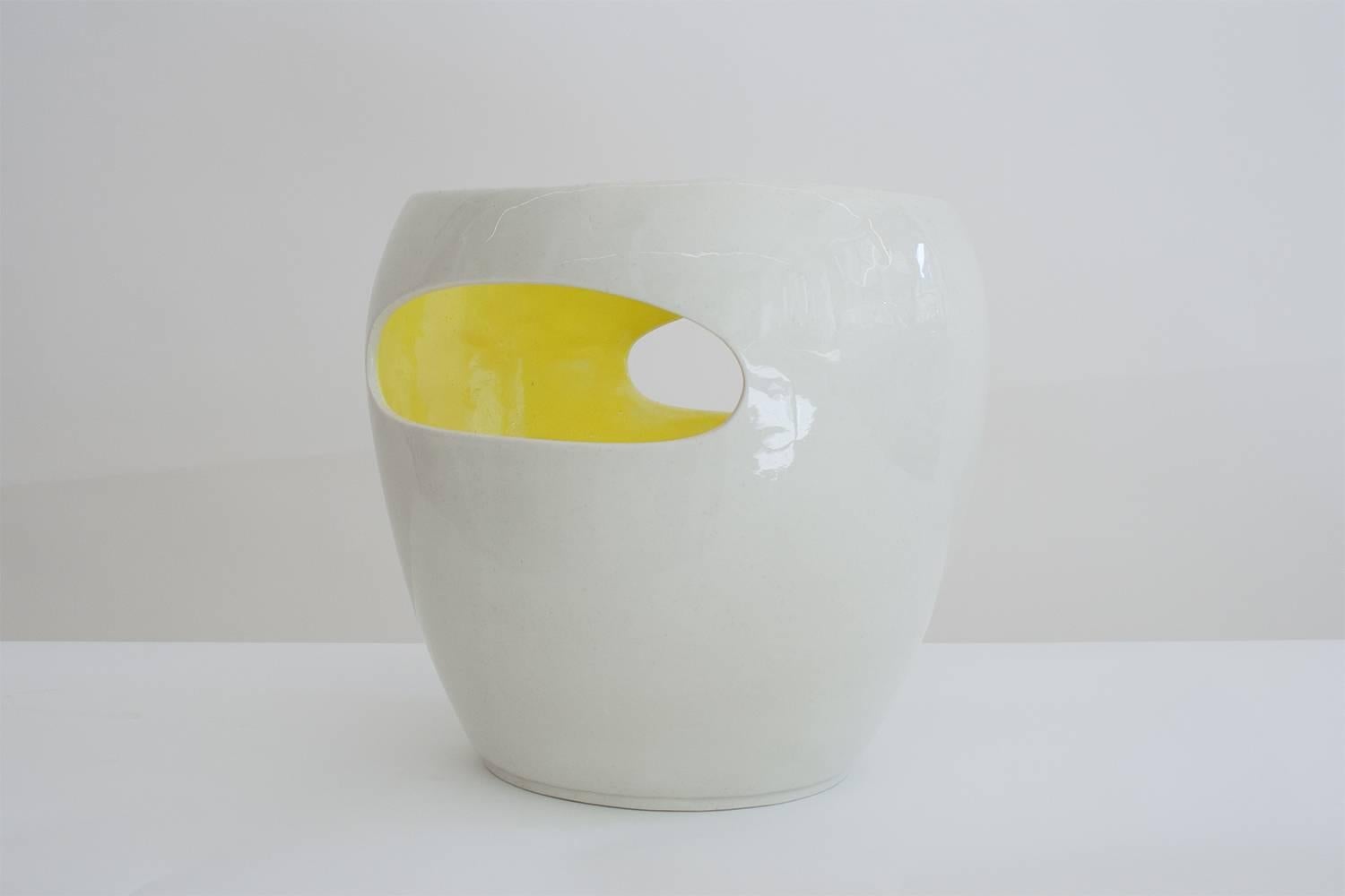 Porcelain vase with bright yellow enameled interior.
Handmade.
One of a kind in this shade of yellow.
Stamped on the bottom.