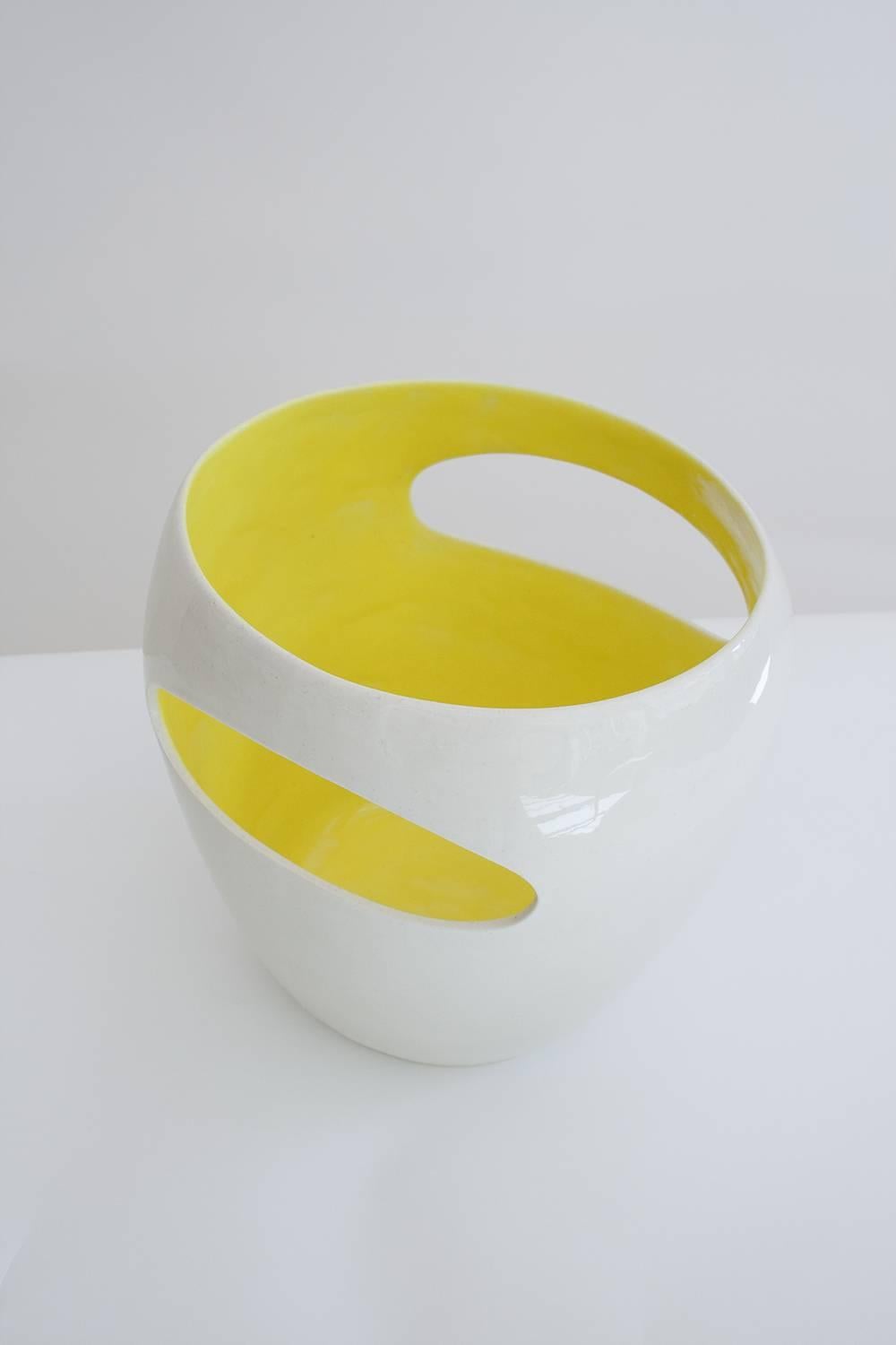 Swiss Schwyz, Porcelain Vase with Bright Yellow Enameled Interior by Philippe Cramer For Sale