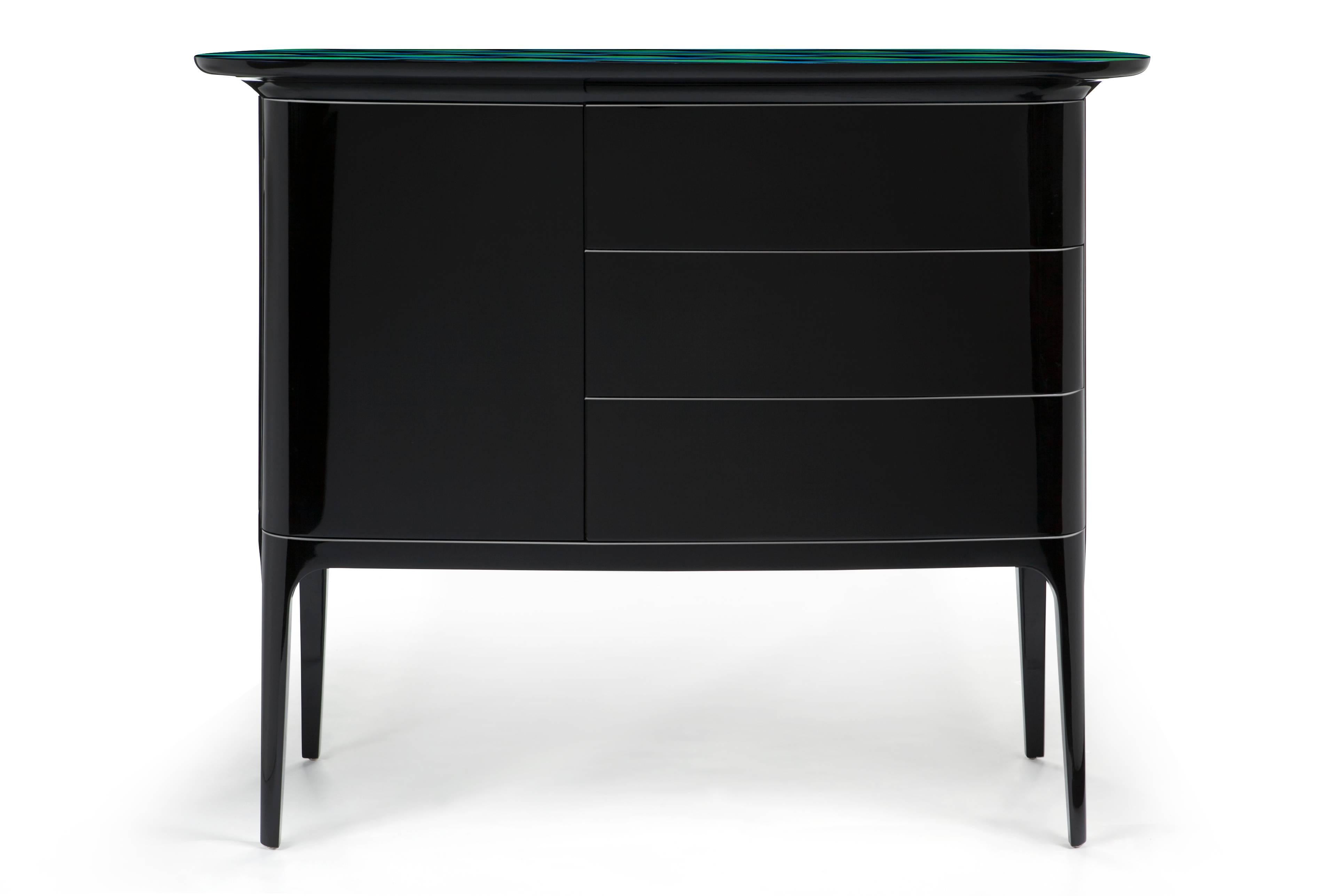 Designed by French Studio Jean-Marc Gady and manufactured by Art cabinet-maker Craman-Lagarde for Fort Royal, Shitake furniture collection elegantly combines black lacquered wood with straw marquetry. 
Shitake is the perfect balance between a