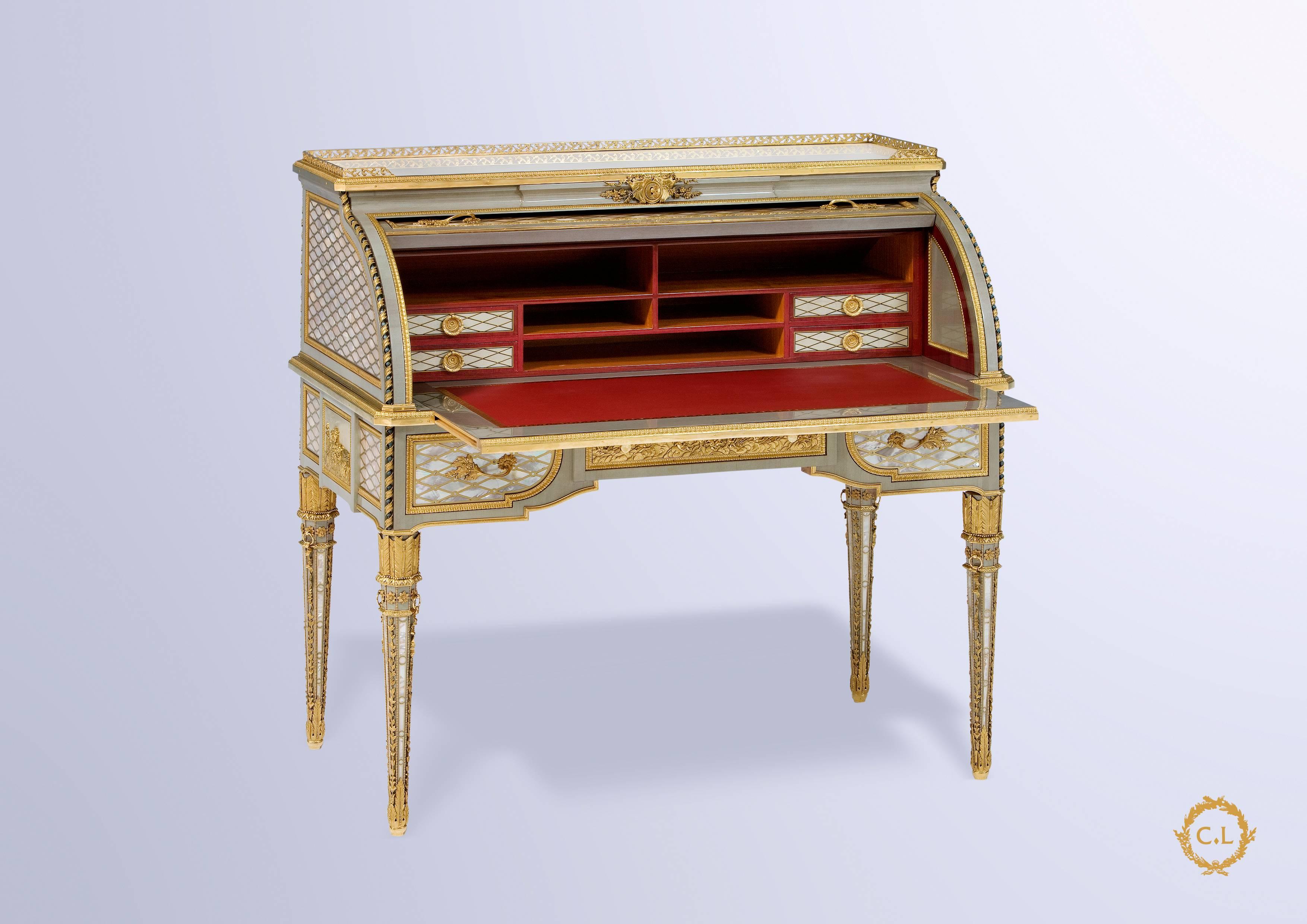 Roll top desk after Jean Henri Riesener named “Secrétaire Marie-Antoinette”.

Exceptional reedition of the original roll top desk by the French cabinetmaker Craman Lagarde. 

Marquetry: Mother-of-pearl, brass and grey sycamore.

Inside: Four