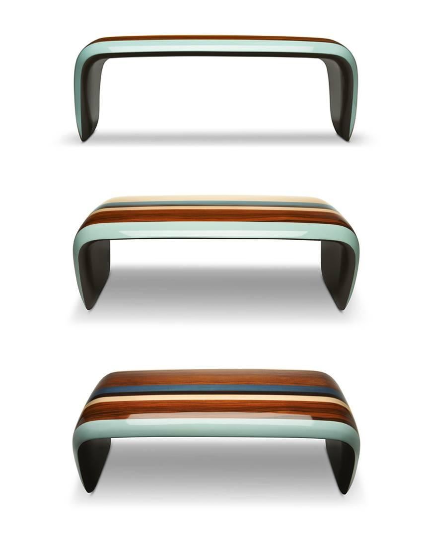 Designed by French Studio Jean-Marc Gady and manufactured by Art cabinet-maker Craman-Lagarde for Fort-Royal, Venice bench is inspired by Hawaiian surfers’ long boards and their mix of exotic woods. The complex marquetry shapes highlight the