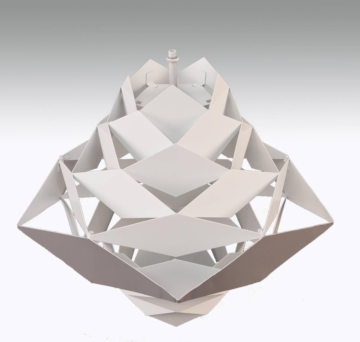 A losange shape pendant light made of white and grey lacquered metal losanges. 
Produced by HF Belysning.