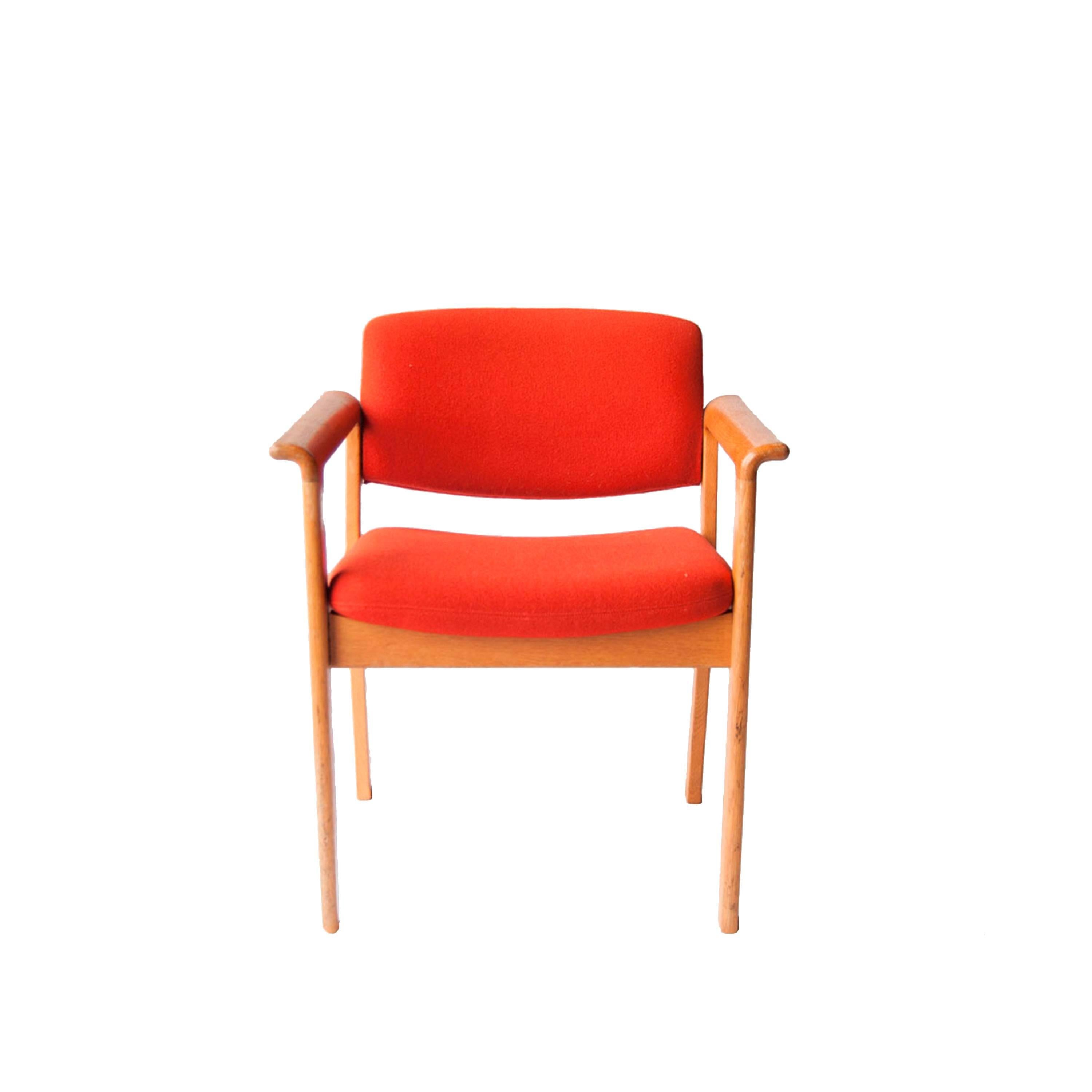 Armchair edited by Hong Stole with structure made of teak, seat and back upholstered in red.