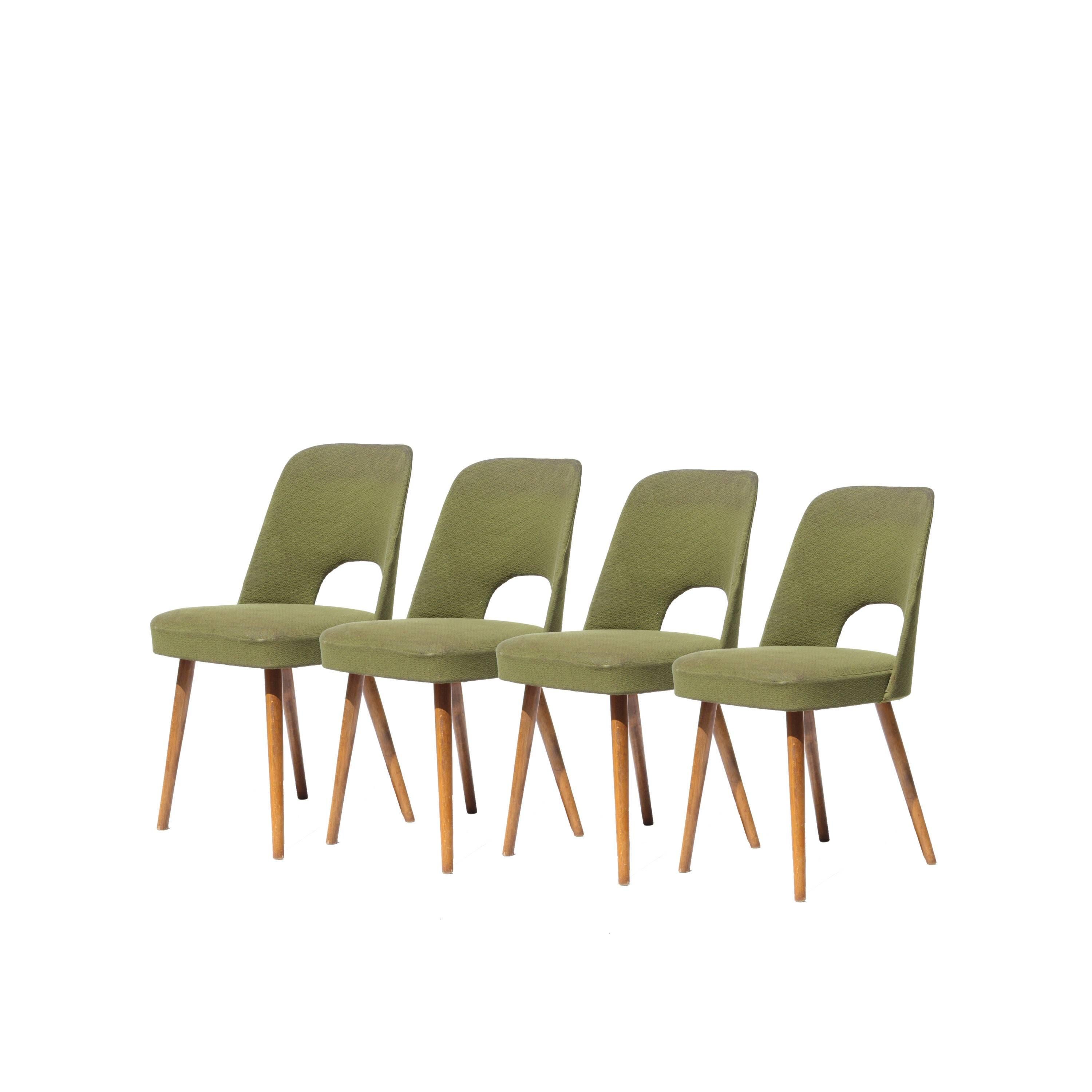Four chair set made of beechwood in the style of Oswald Haerdtl. Green upholstery.
