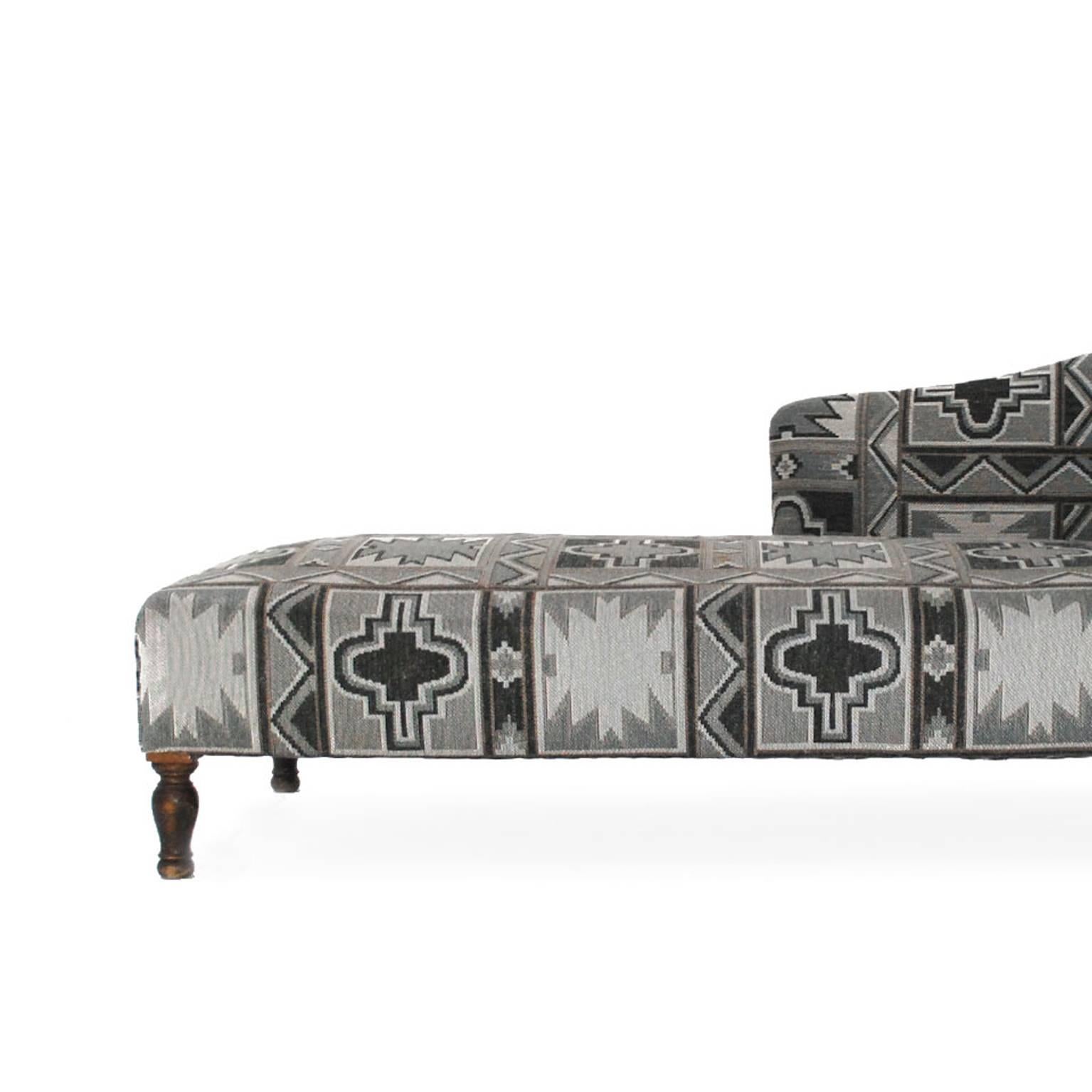 Chaise longue with structure in solid wood, upholstered in woolen cloth with ethnic print designed and edited by Gancedo.