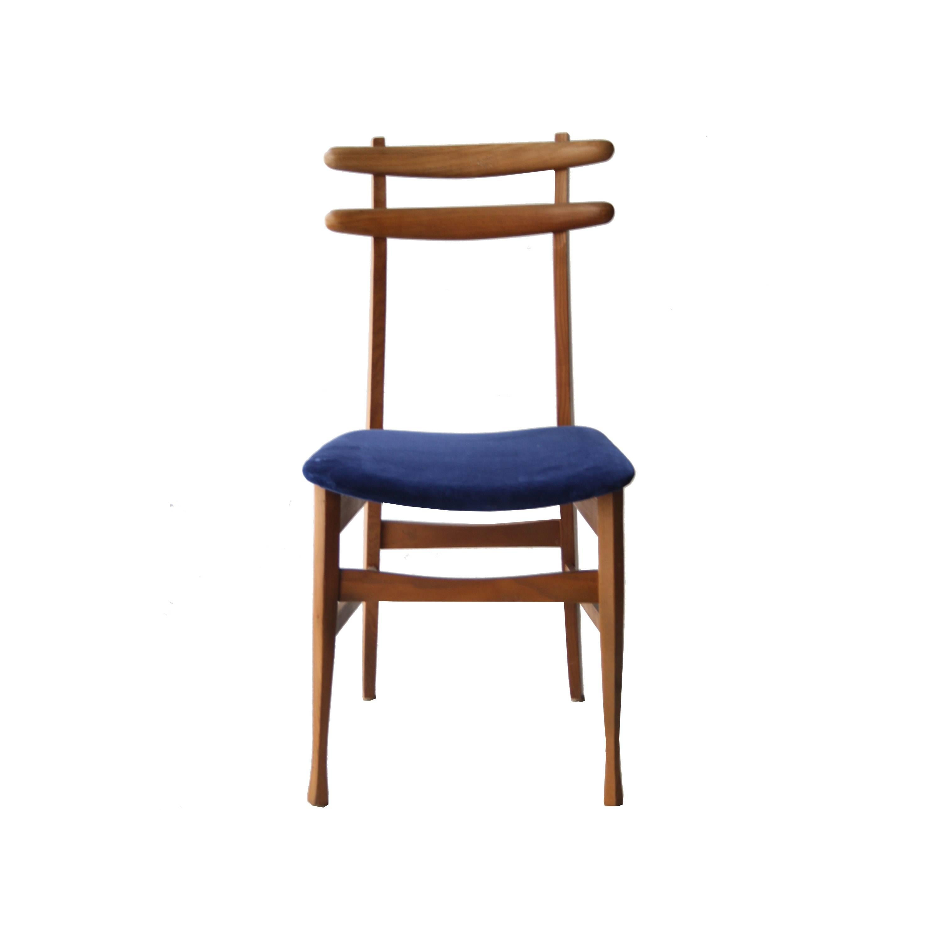 Set of six chairs with solid teak wood structure attributed to Vitorio Dassi. Seat upholstered in cotton blue velvet.