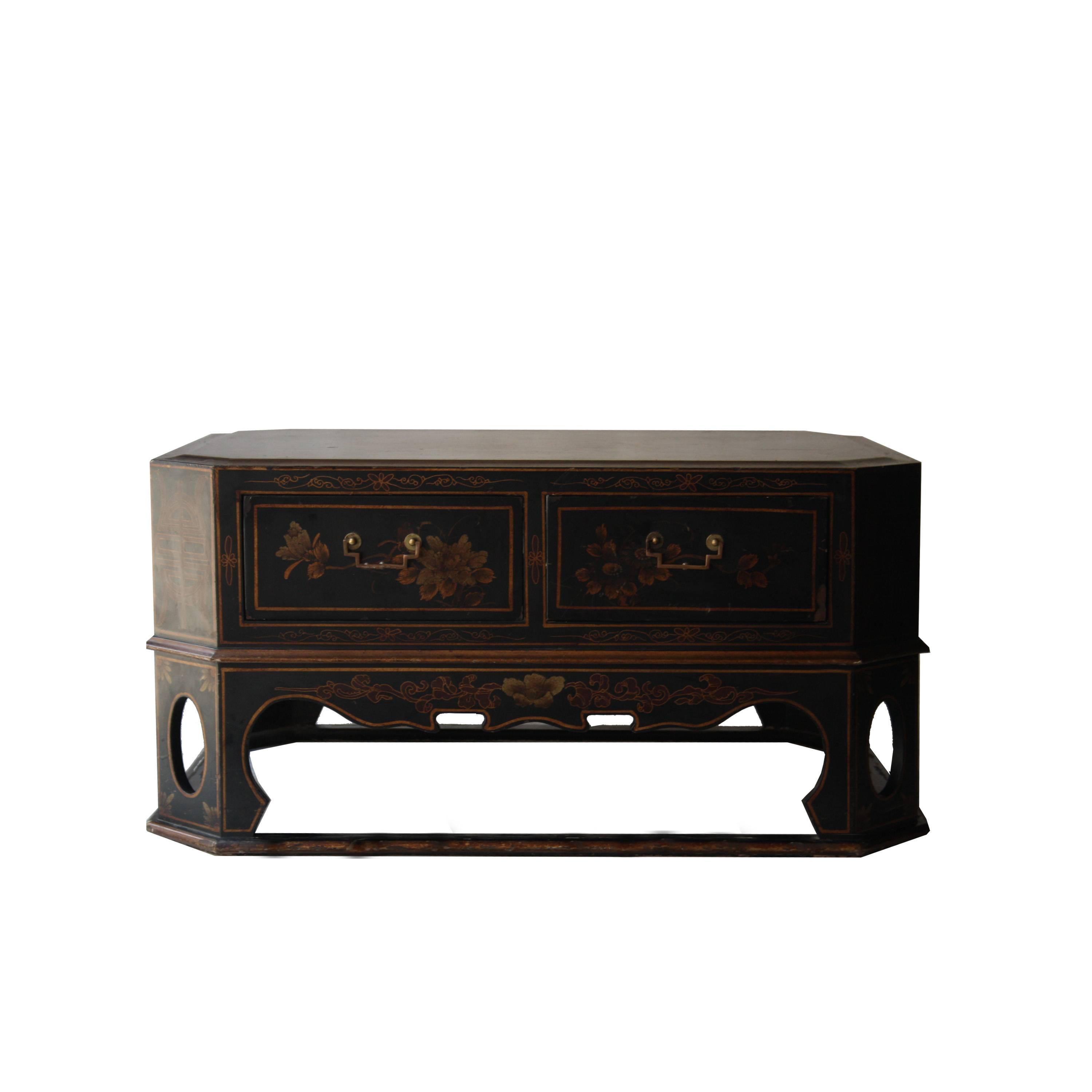 Octagonal centre table made of handcrafted wood. Black and golden lacquered finishing with oriental motifs.
 