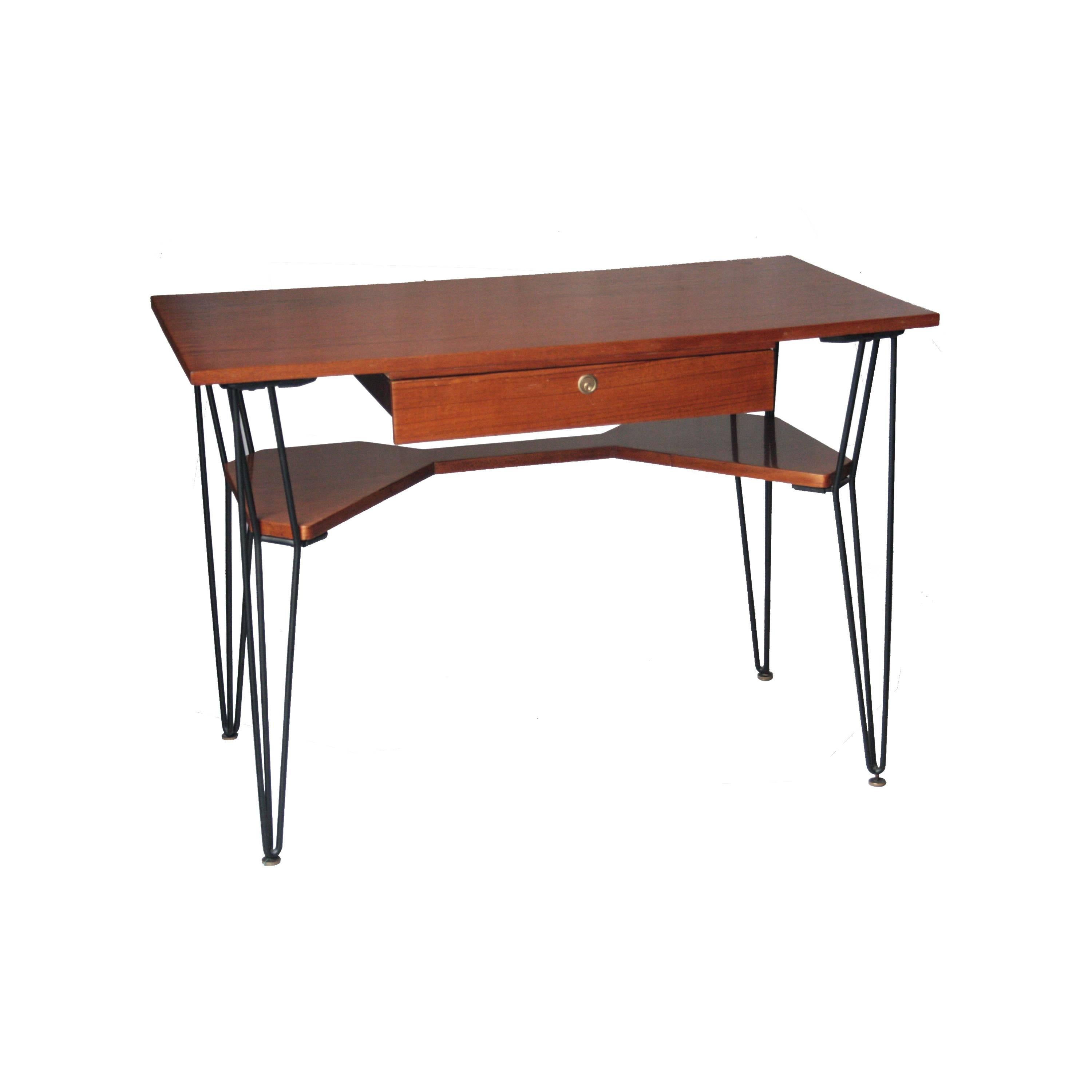 Desk with top, drawers and shelf below made of rosewood and black lacquered metallic legs.

 