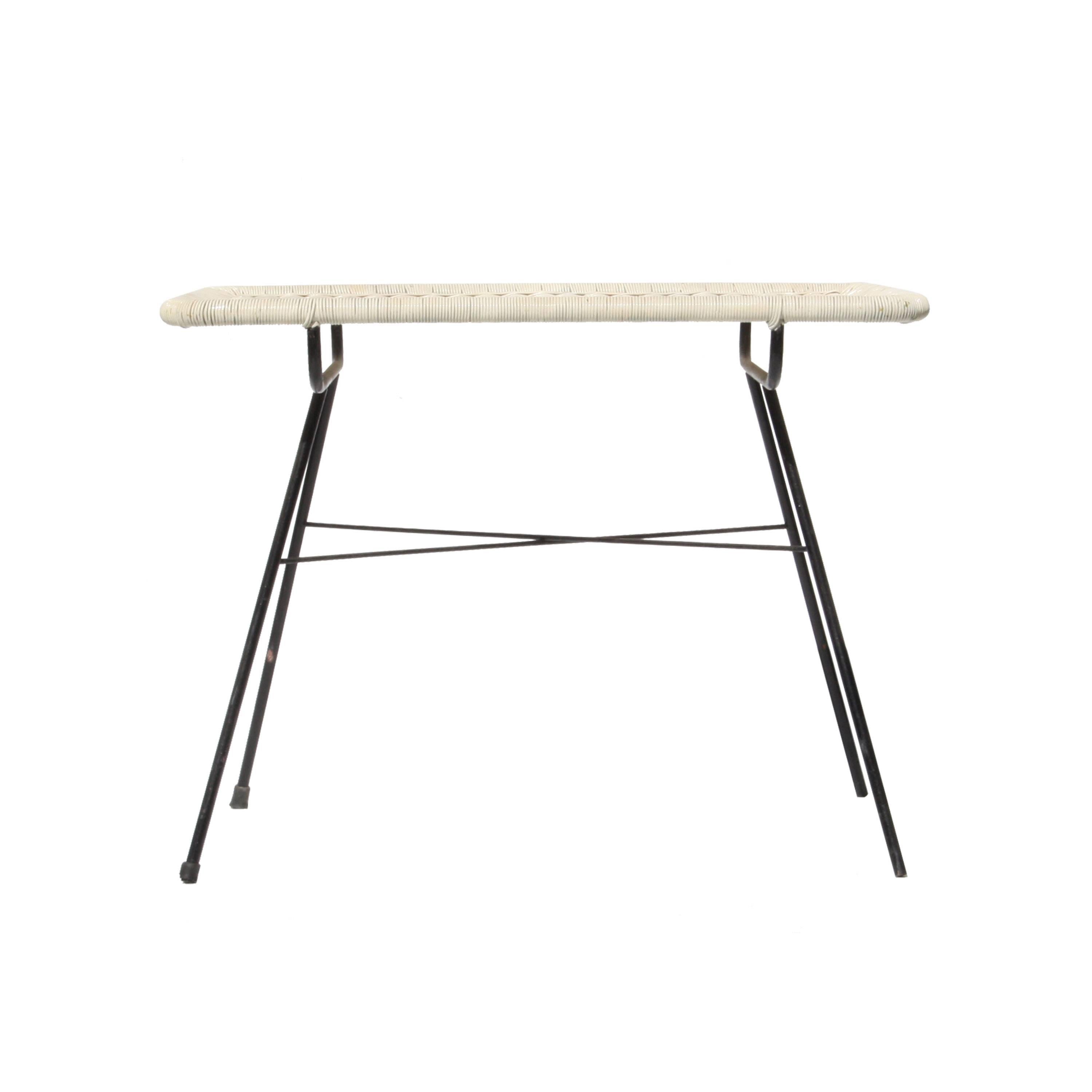 Black lacquered metallic structure side table with handcrafted natural synthetic fiber top painted in white.
 
