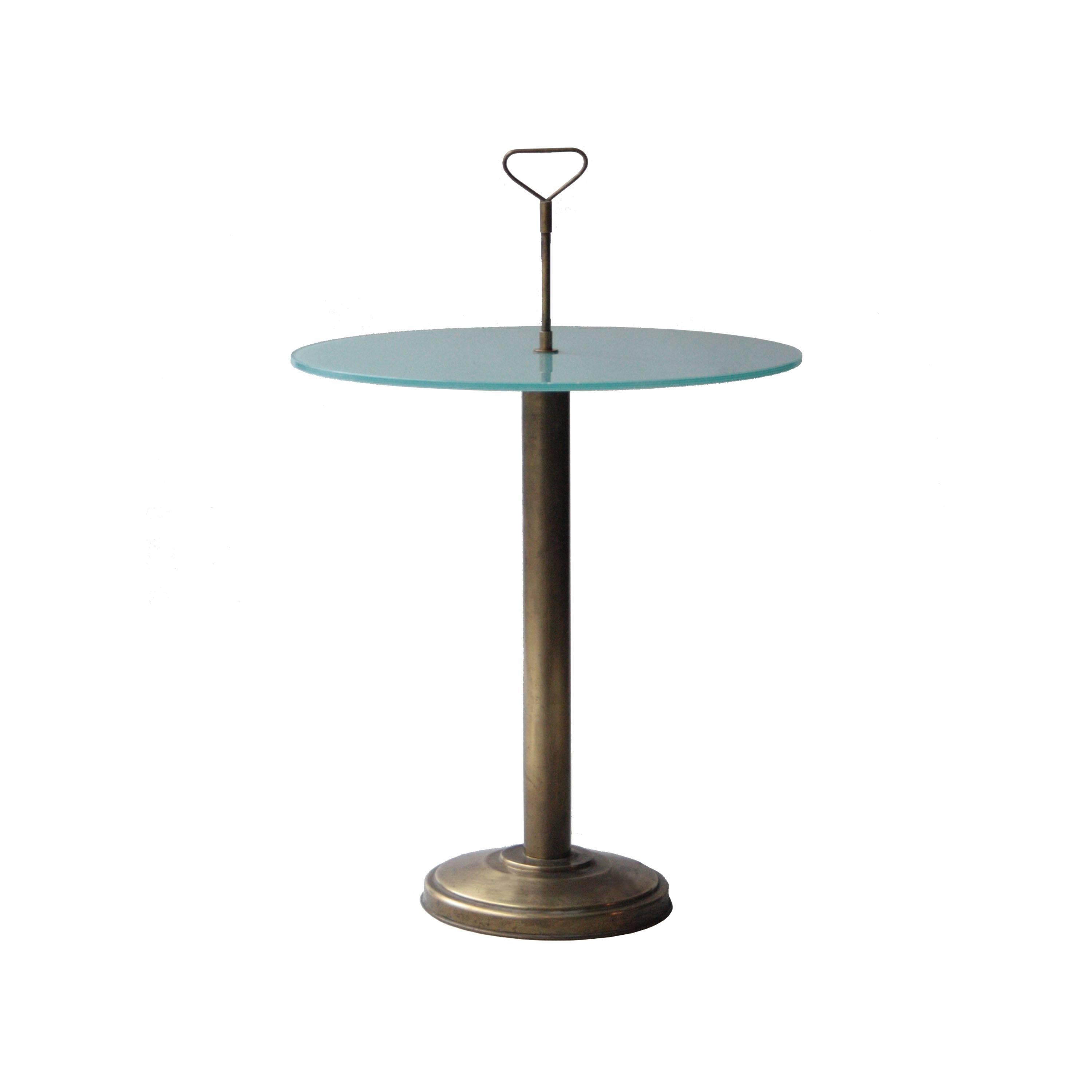 Side table with foot and base made of brass and green glass lacobel top.