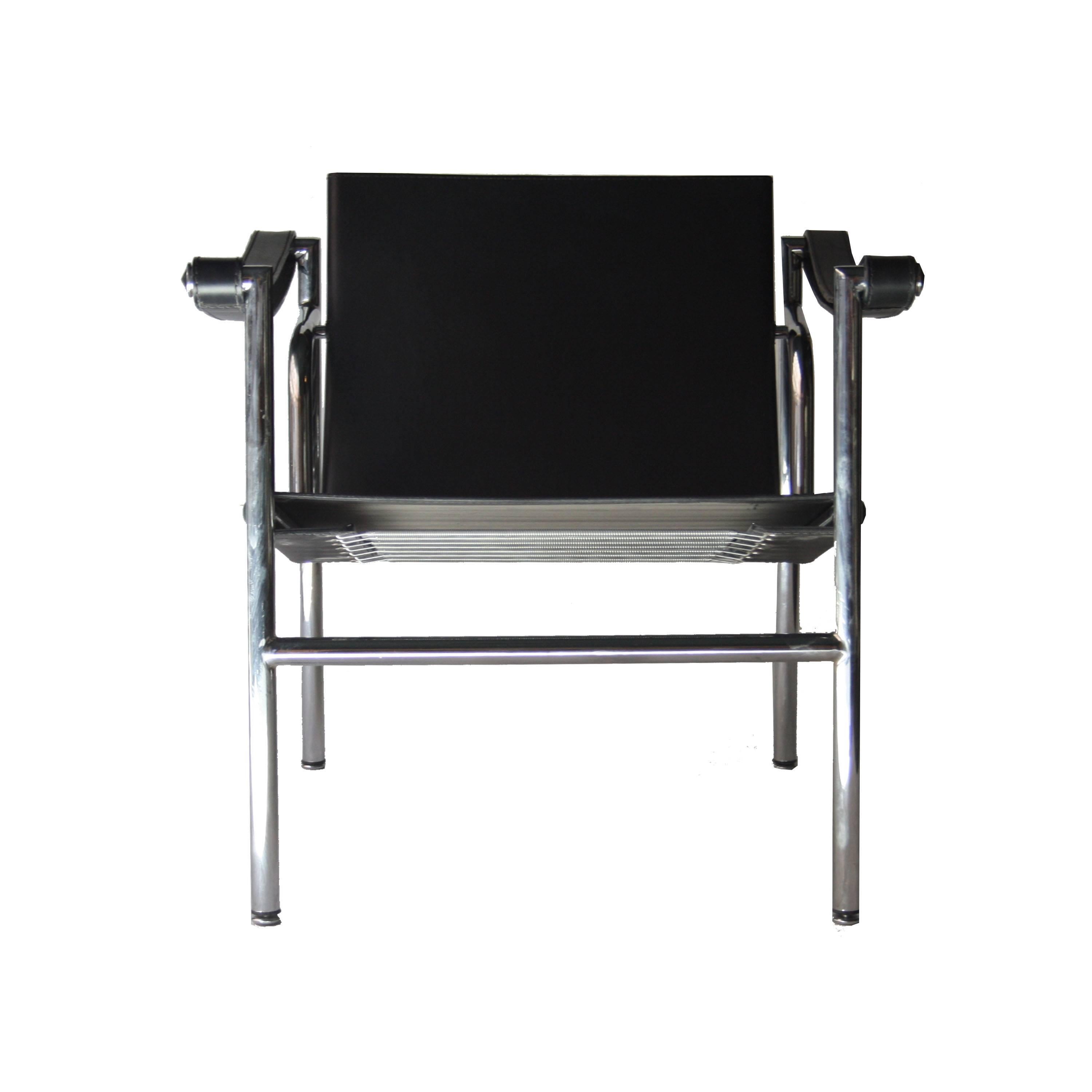 Armchair with chrome tubular steel structure in style of Le Corbusier, arms and seat with original black leather.