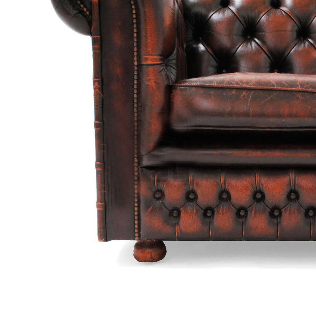 Four-seat chesterfield sofa with the original leather.