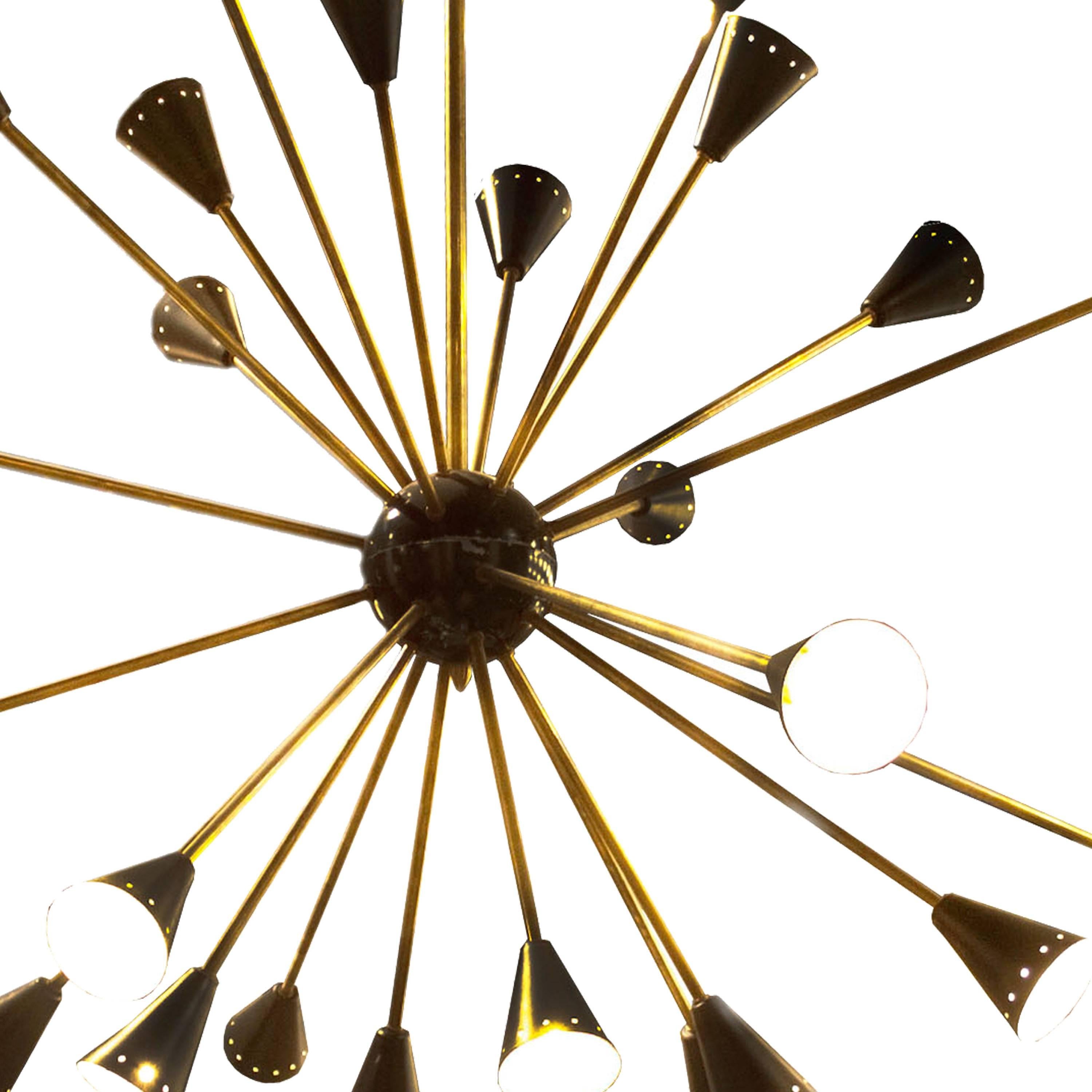 Lamp model Sputnik with 16 points of light with structure realized in brass finished in conical screens lacquered in different colors around a metallic sphere of brass.