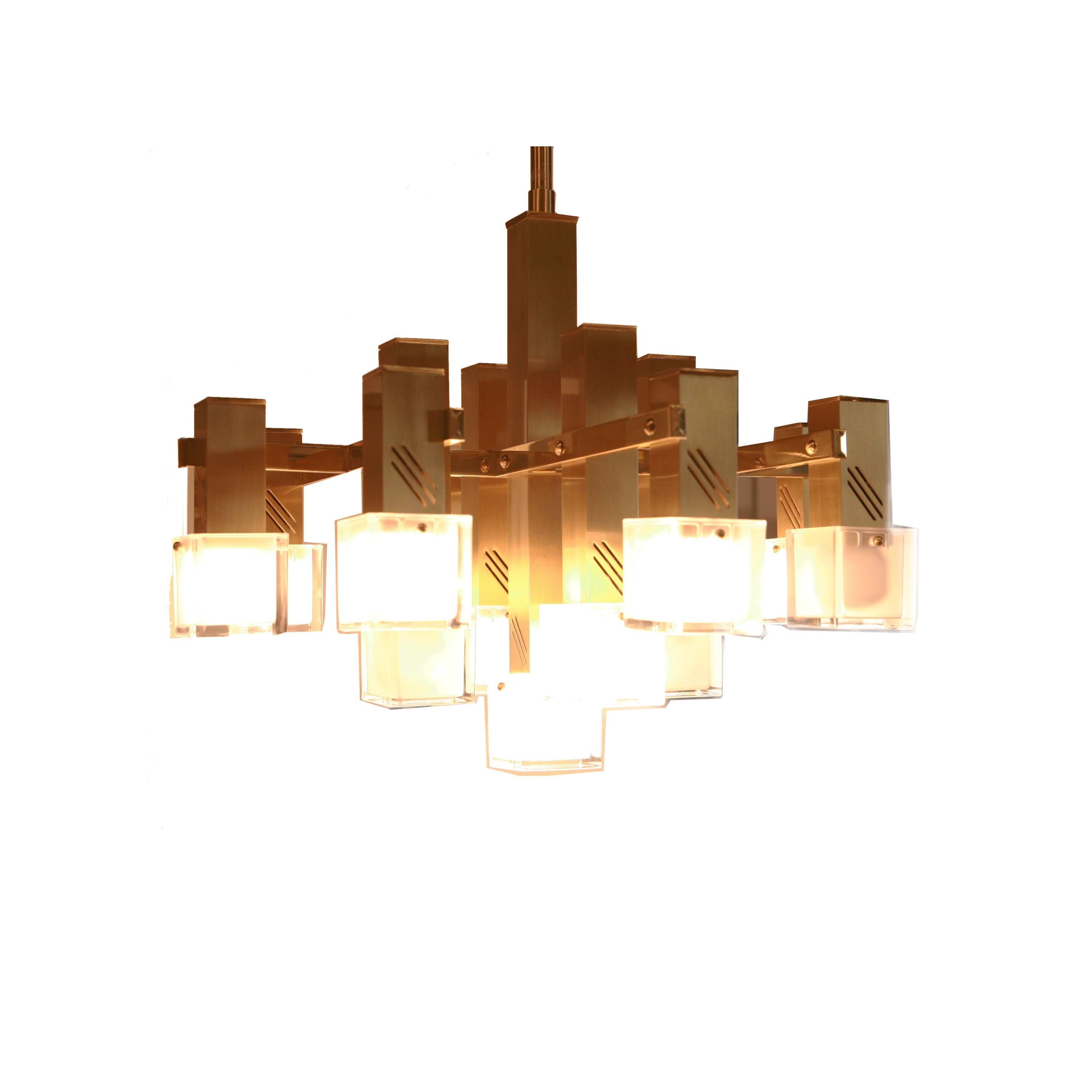 Ceiling lamp with brass structure with 12 points of light with crystal tulips.