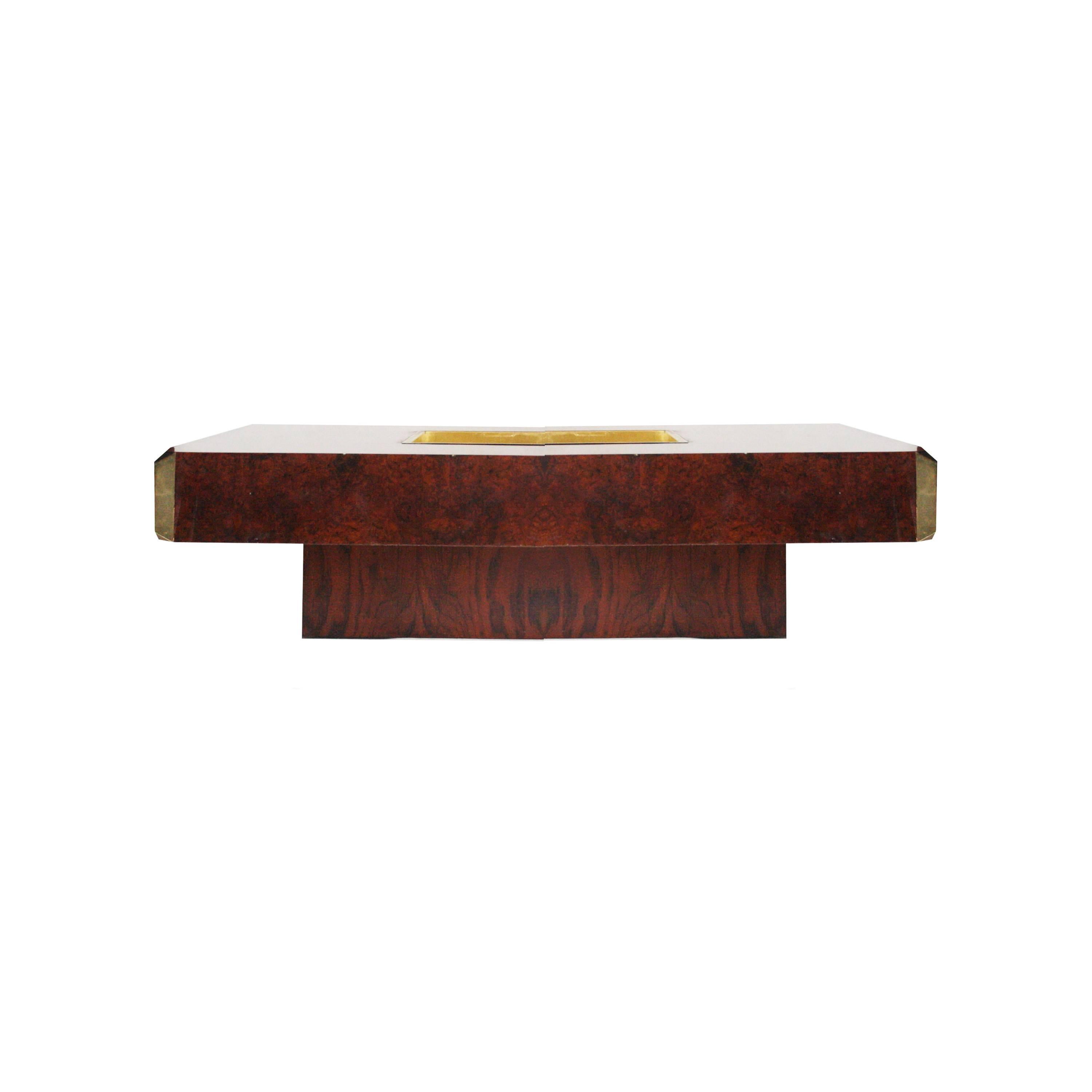 Coffee table designed by Willy Rizzo (1928-2013) solid wood structure covered in thuja root with corners and embossed wine rack made of brass.
