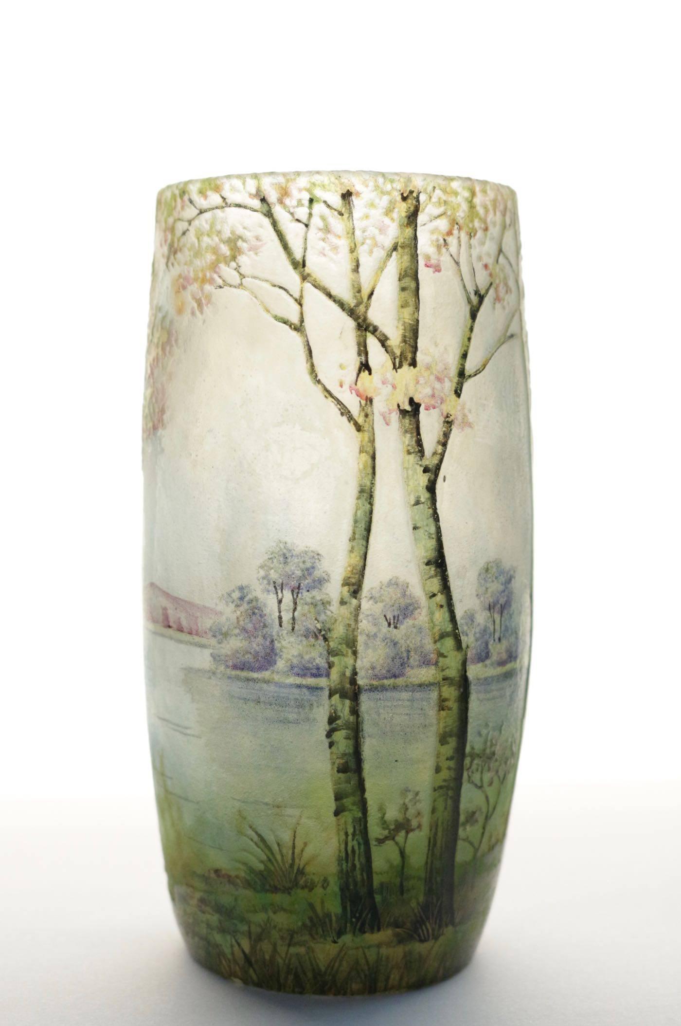 Daum Nancy
Daum enameled glass 'Sprint Landscape' scene vase
Goblet vase cameo glass
Acid etched and enameled with a forest landscape and lake, circa 1905
Possibly to get winter goblet for pair.