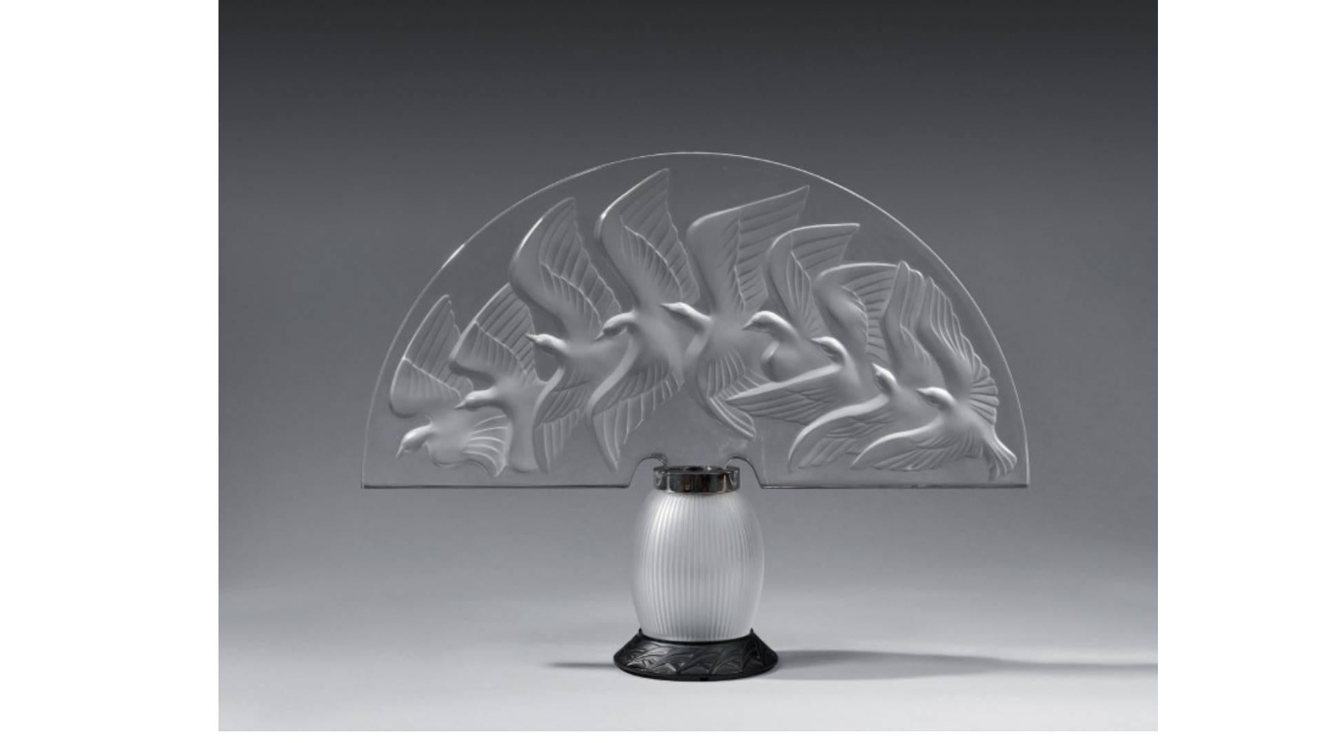Lalique crystal Hokkaido lamp, frosted and clear art glass table lamp with doves
Lalique crystal Hokkaido frosted and clear crystal lamp.
Designed 1990 by Marie-Claude Lalique, etched in script ''Lalique France'', the base further etched