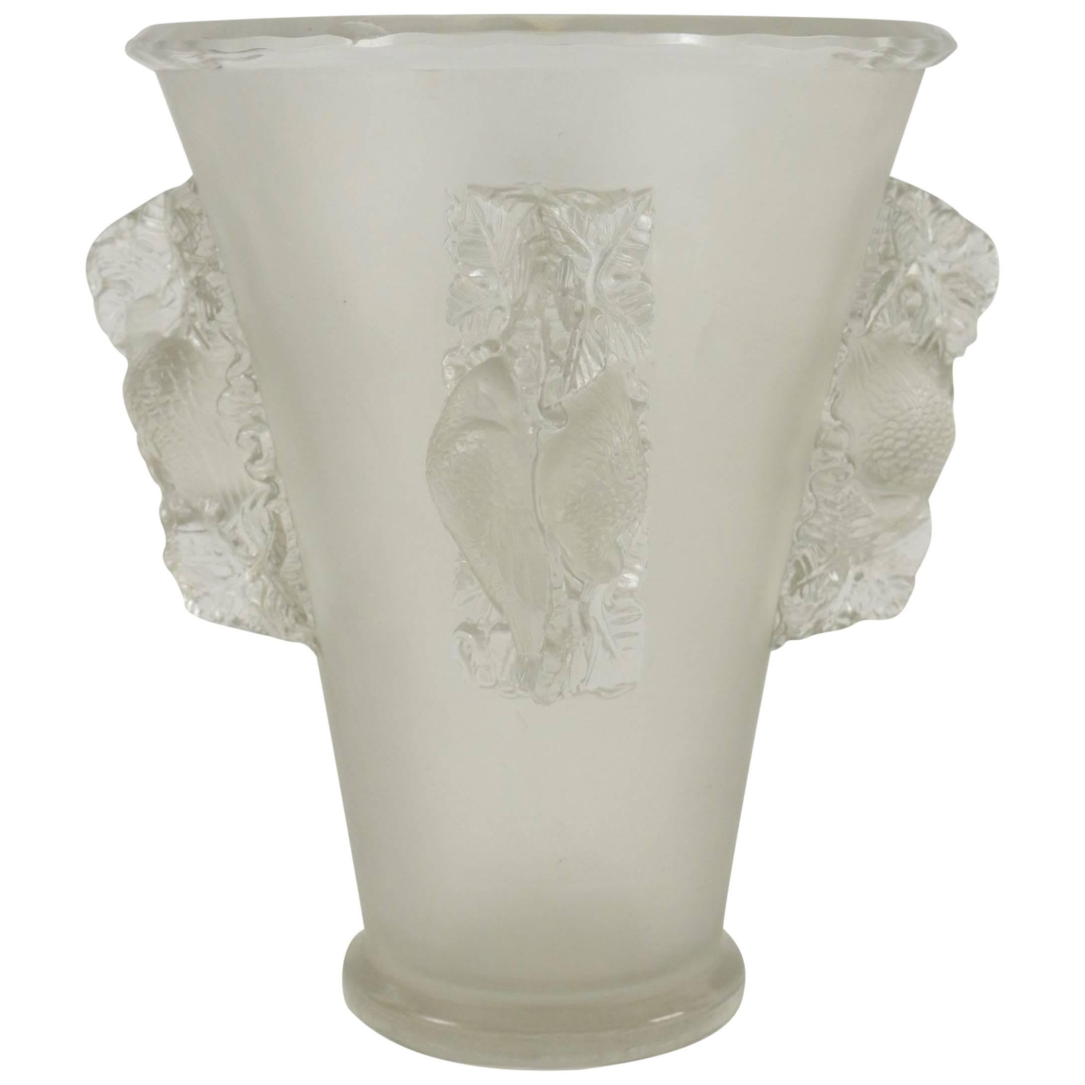 Clear and frosted Lalique vase featuring four panels with high relief birds
large high relief fowl motifs spaced evenly around the outside
 signature Bibliographie: Félix Marcilhac, 