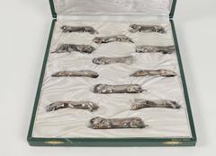 Set of 12 Christofle 'Gallia' Metal Knife Rests