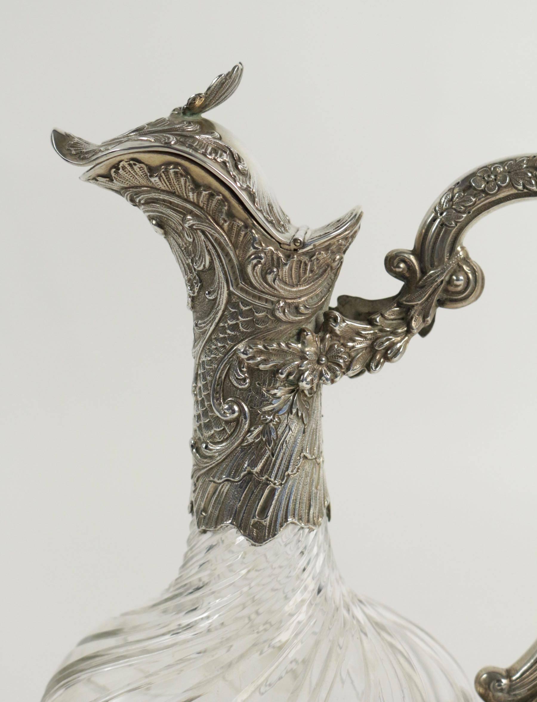 French sterling silver and cut-glass one claret jug.
Possibility to get in pair.
 Rococo styling spiral cut body.

Napoléon III silver and crystal wine decanter or Claret Jugantique French hallmarked sterling silver and cut glassornate with