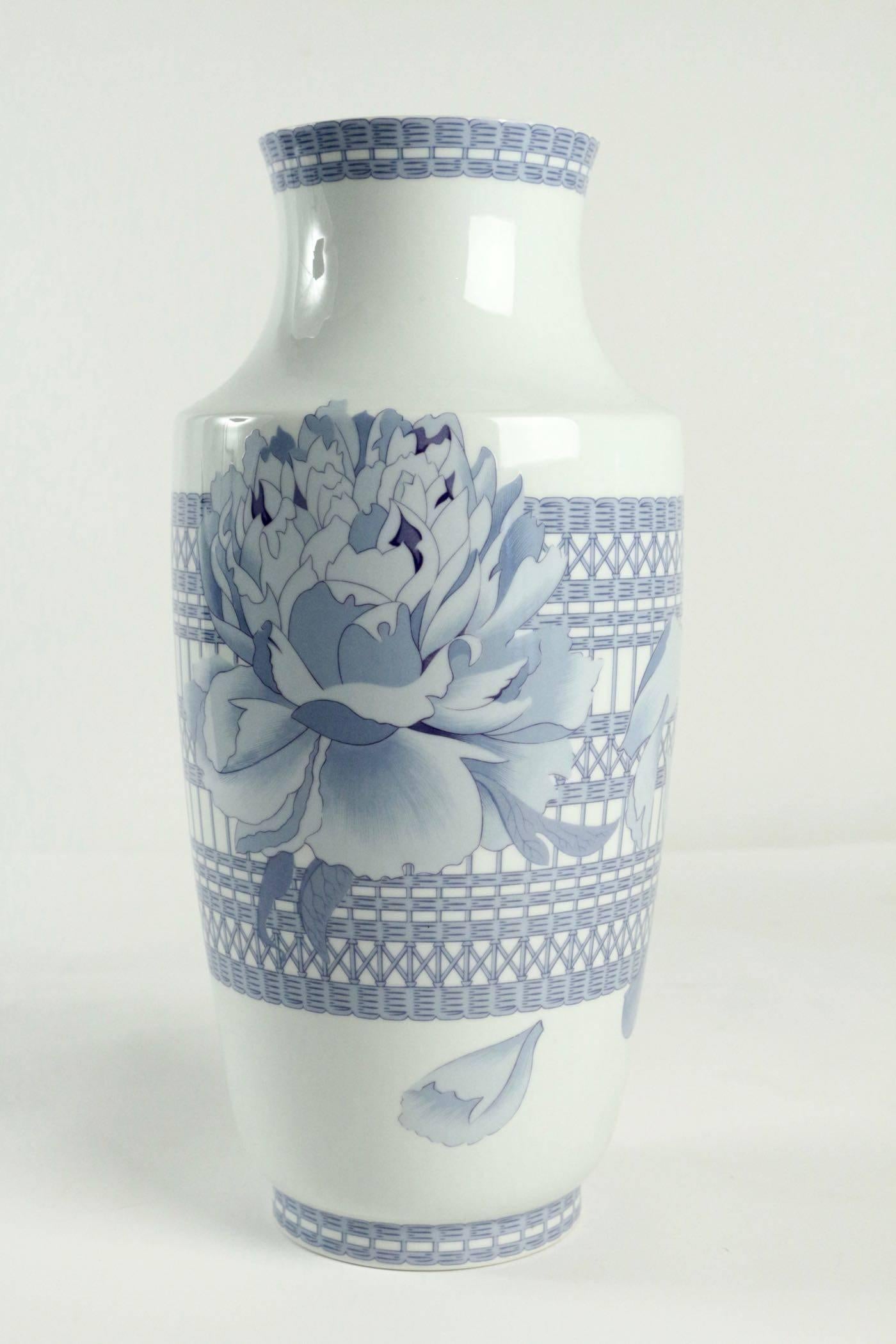 Hermes vase
Made in France
Pattern: Les Pivoines (Peonies) 
Blue peonies basket weave pattern
Vase: 12 3/4 height, 18 1/2 width, mouth of vase 4 inches 
Beautiful with fresh peonies in vase. 
In perfect condition 
This pattern has been