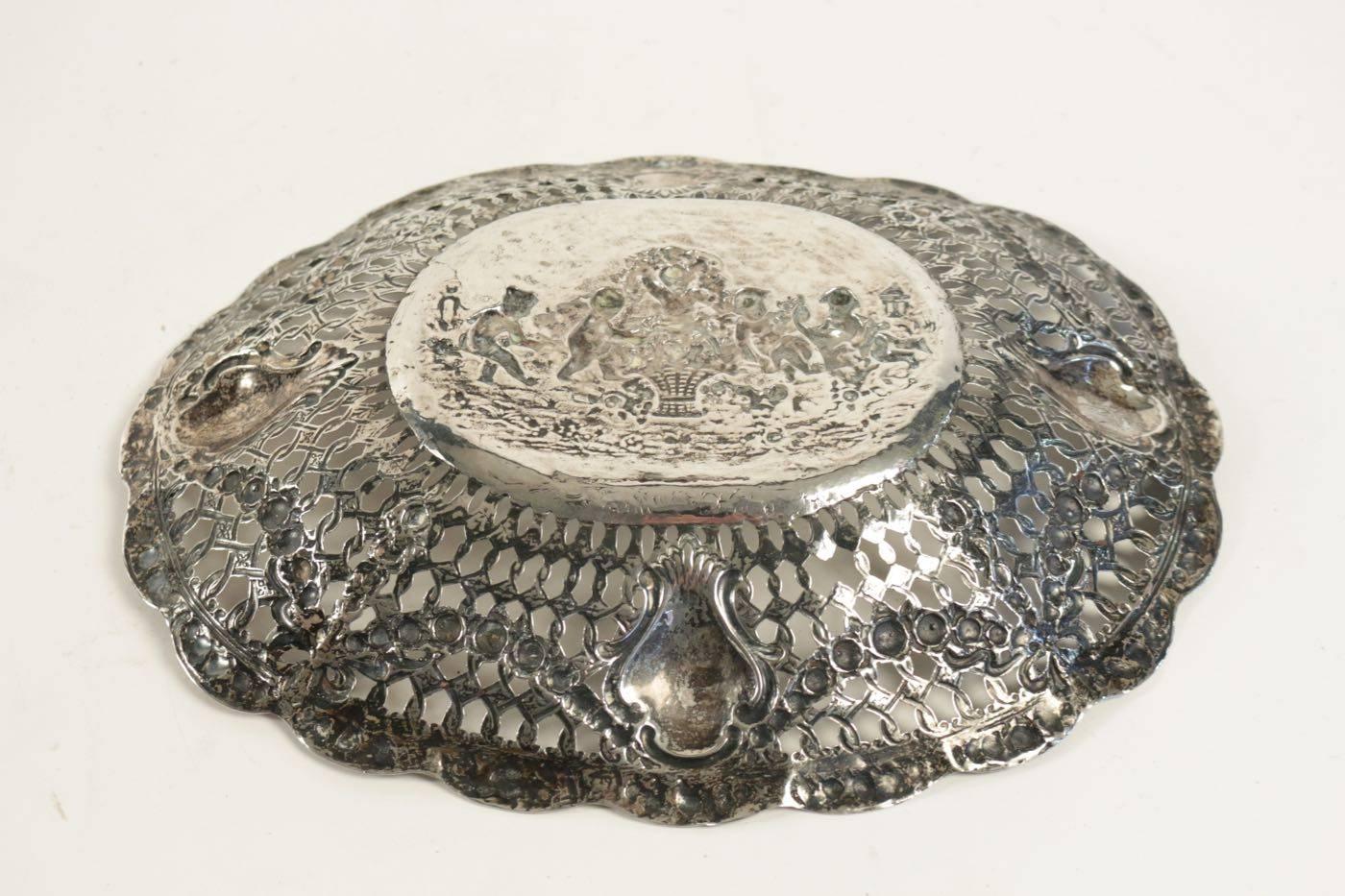 Repoussé 19th Century Sterling Silver Pierced Dish with Cherubs and Garlands of Flowers