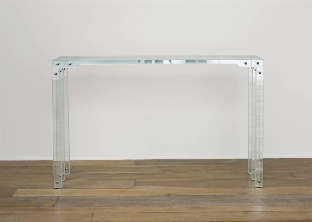 Console made of strips of tempered glass by French designer Thomas Lemut.