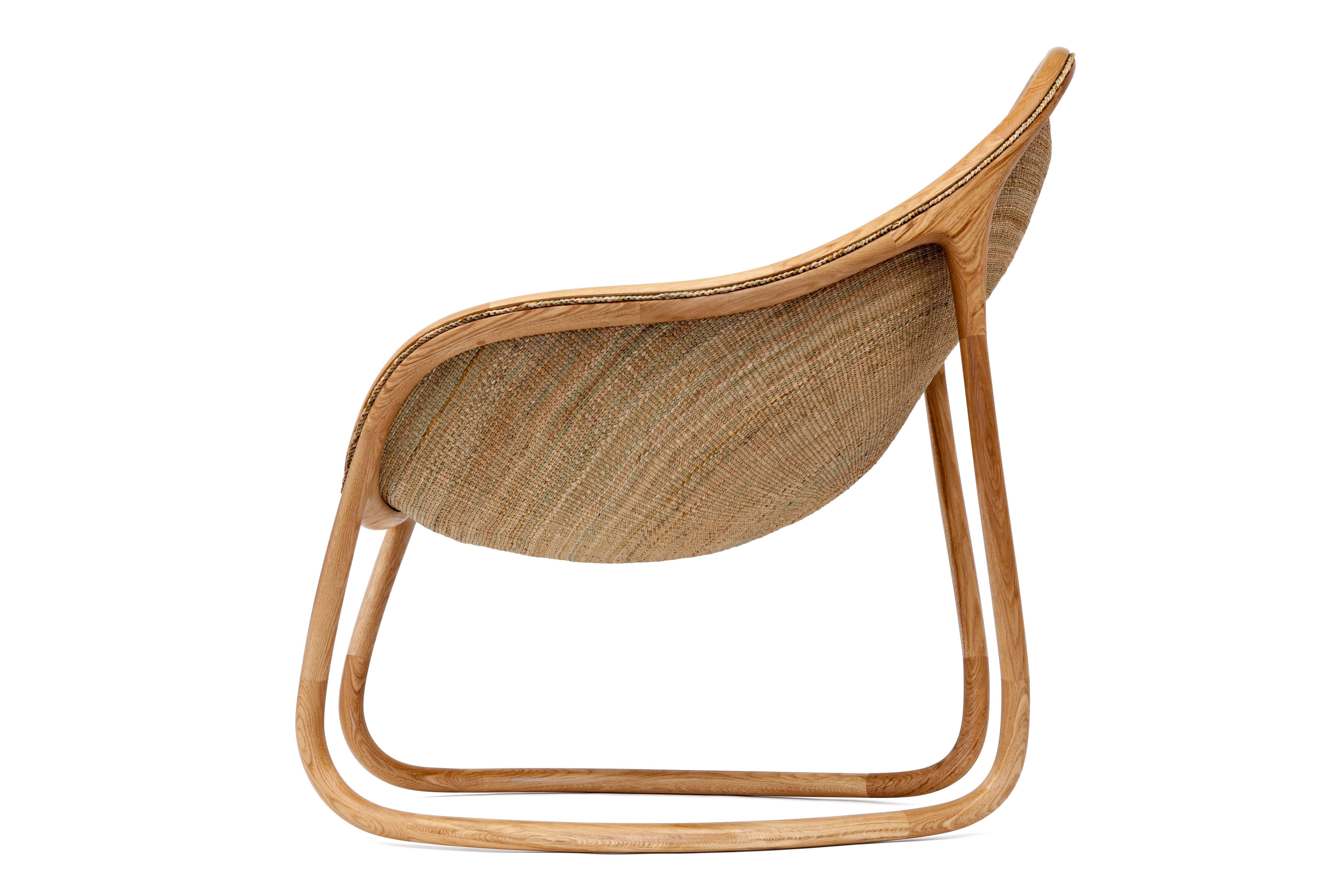 Milled from English oak using five axis CNC, the chair is a composition of 28 sculptural components designed and assembled by Christopher Jenner.
The seat was woven by Felicity Irons using Scirpus Lacustris, a native English Rush she harvests on