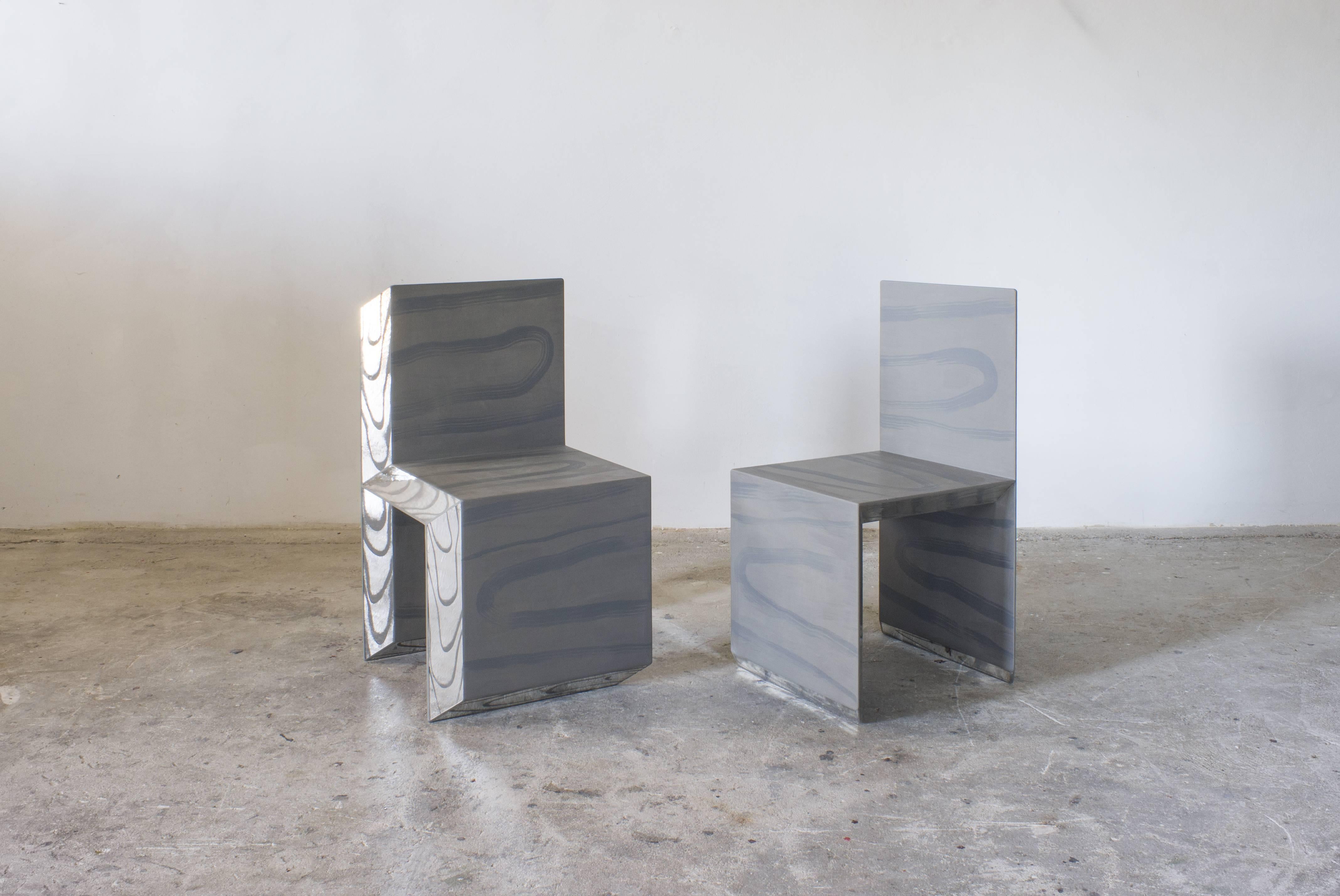 Chairs made of colored mirror and painted panel. 

Available in three colours: 

Silver patinated mirror, painted panel in shades of grey.
Amber mirror, painted panel in shades of grey. 
Garnet pink mirror, painted panel in shades of grey. 



