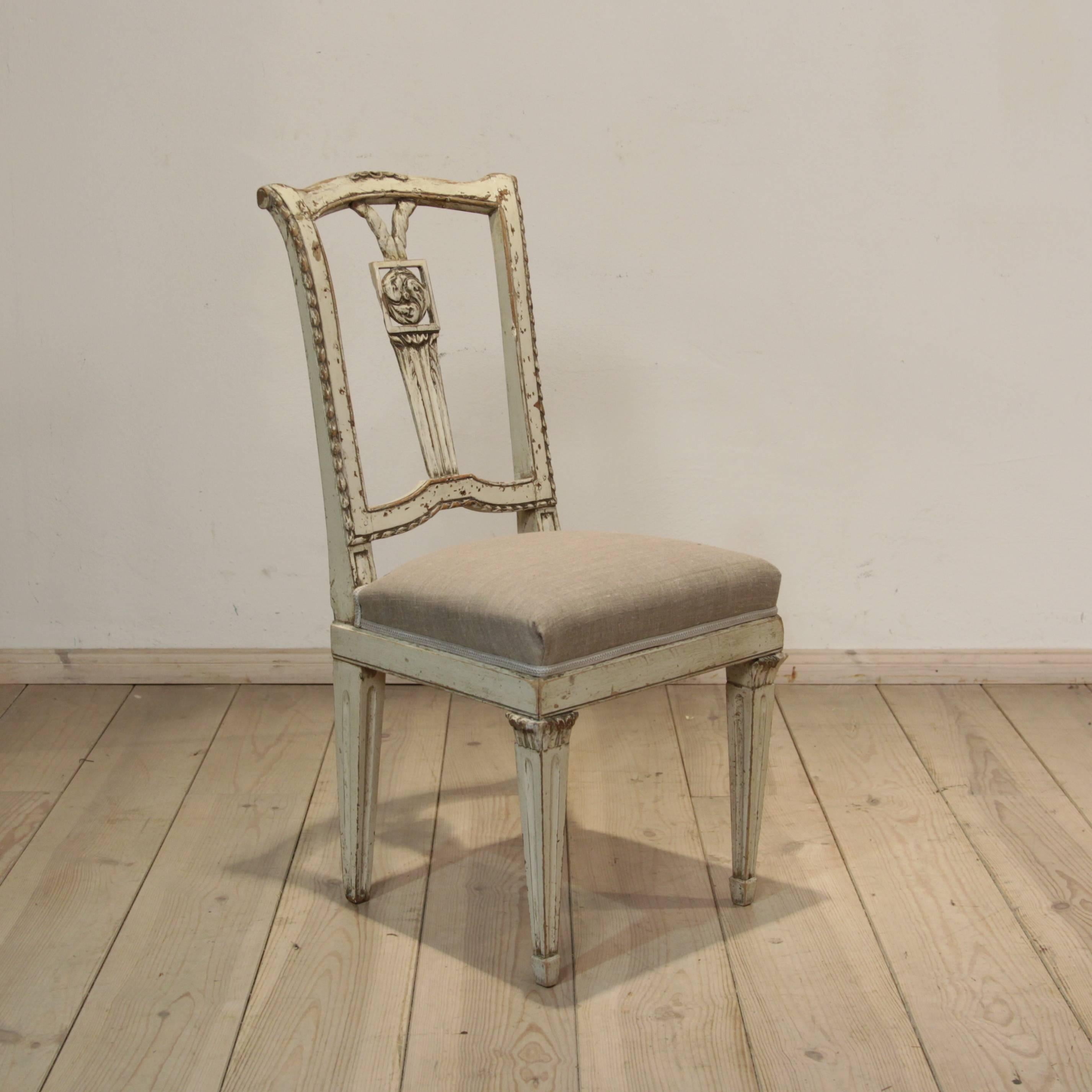 This Italian Louis XVI chair from, circa 1780 is made of beech and has its original paint. The linen cover is new.