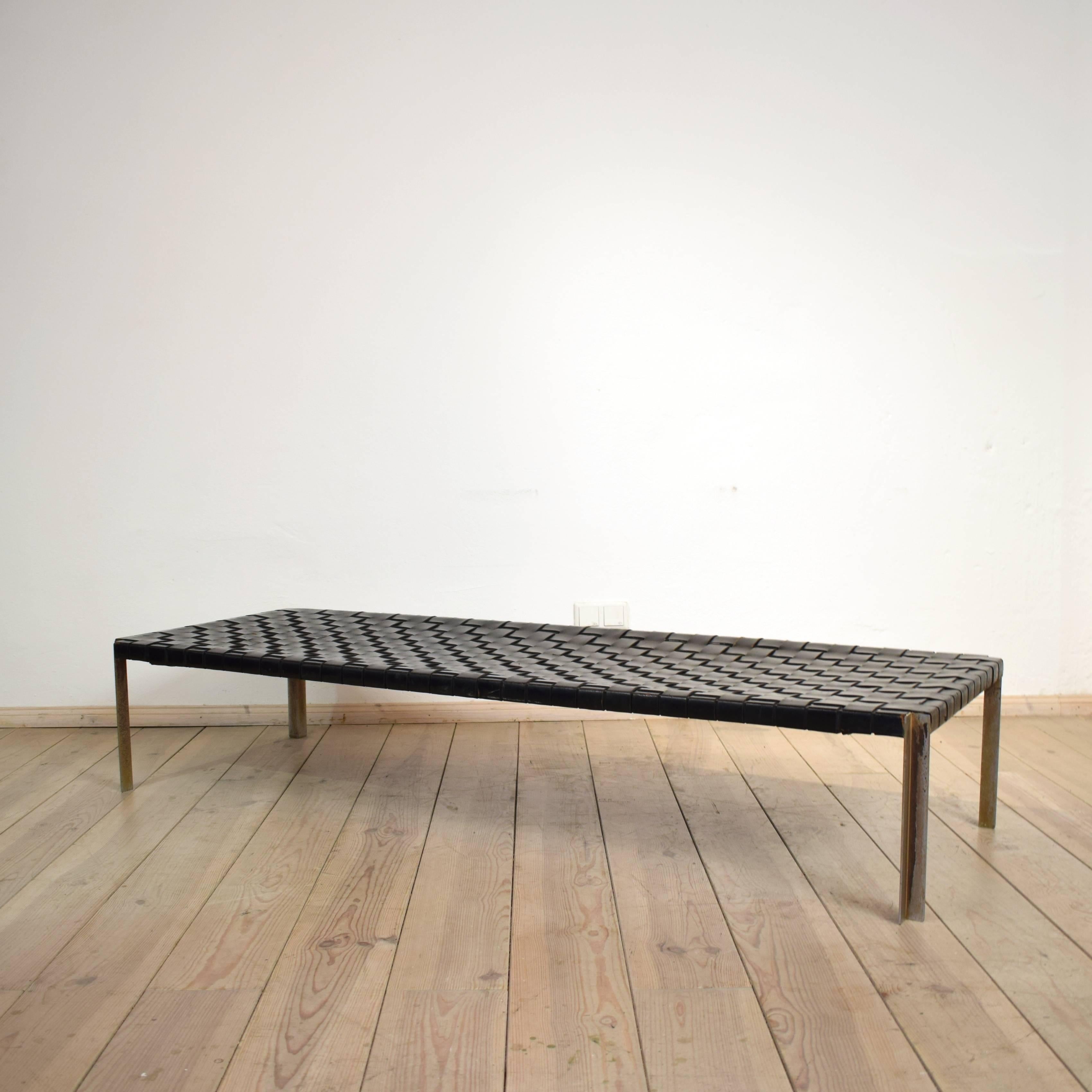 This leather and chrome daybed was designed by Erwin and Estelle Laverne in the 1960s.
The daybed has his original leather and shows a great patina. The chrome legs are suffered a bit and shows partly the metal underneath.
It is a rare and elegant