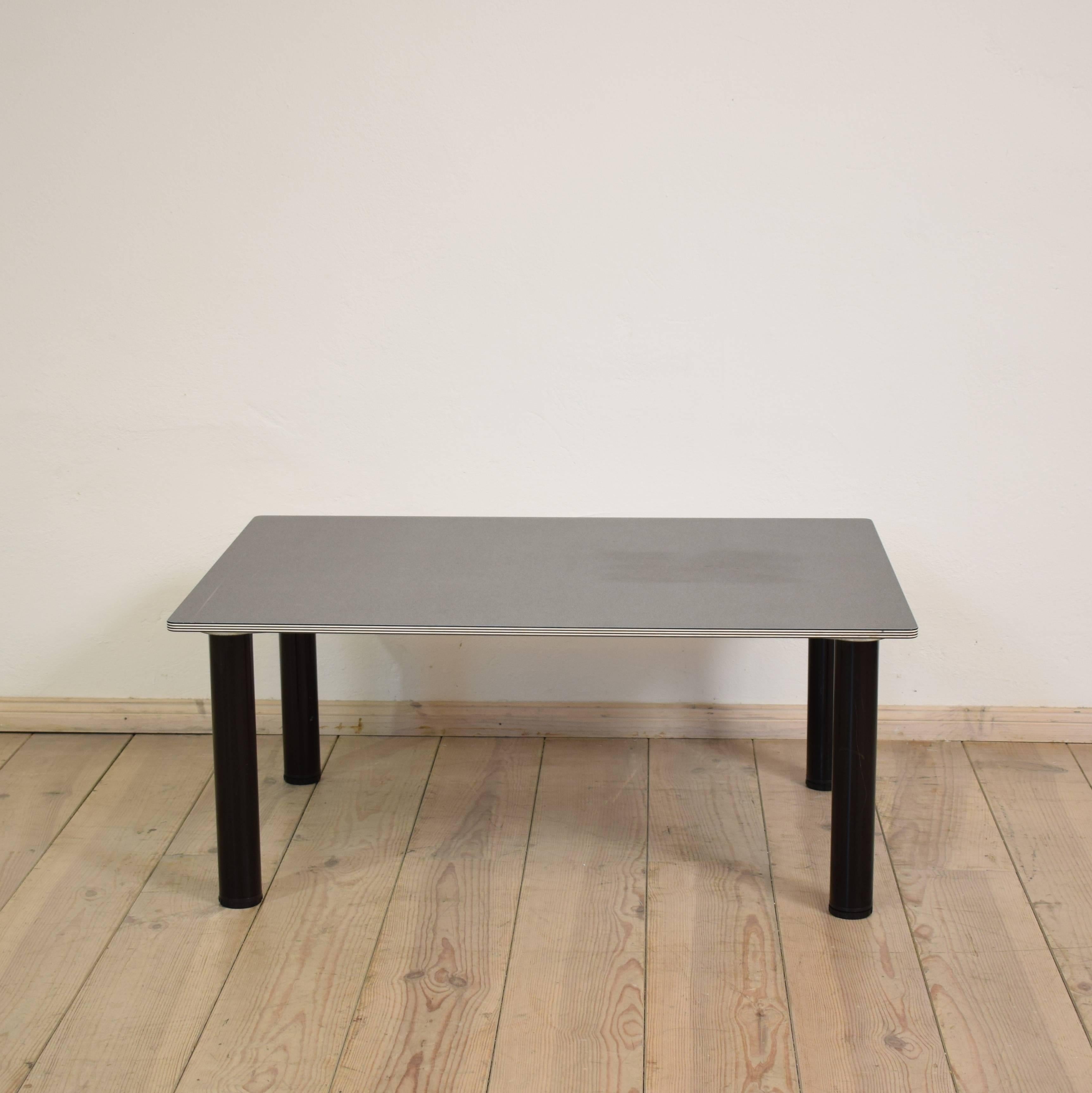 This couch table was designed and built in the mid-1980s in Italy.
It is made out of different plastic materials and metal.
The legs can be screw-on.
The top has got a small scratch (have a look at the photos)
A elegant and simple design which