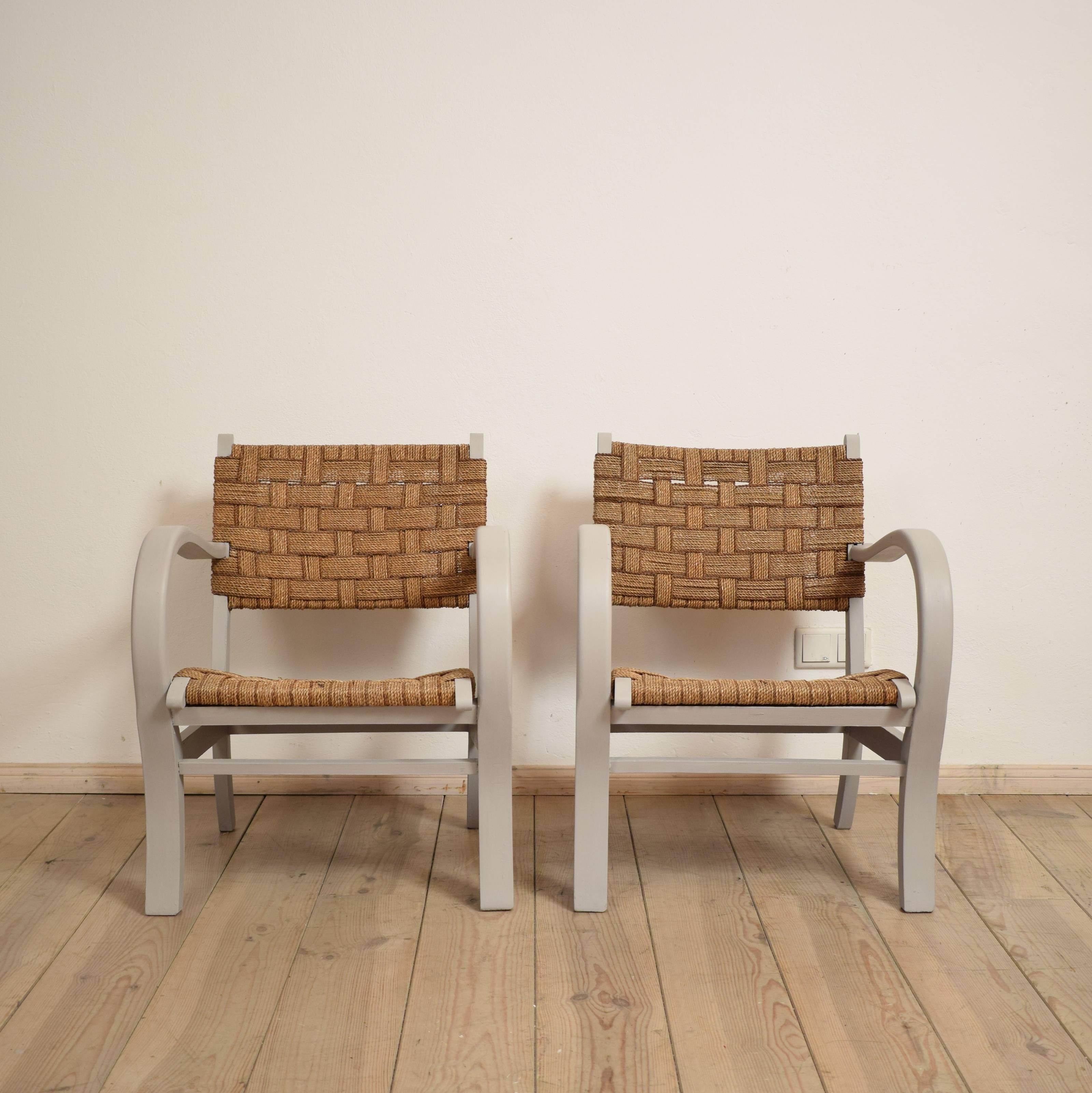 This pair of 1920 armchairs by Erich Dieckmann are painted in a grey chalk paint and remain their original canework.
The chairs were made in the Bauhaus era and have the typical simple design.
Great pair of armchairs which are very comfortable and