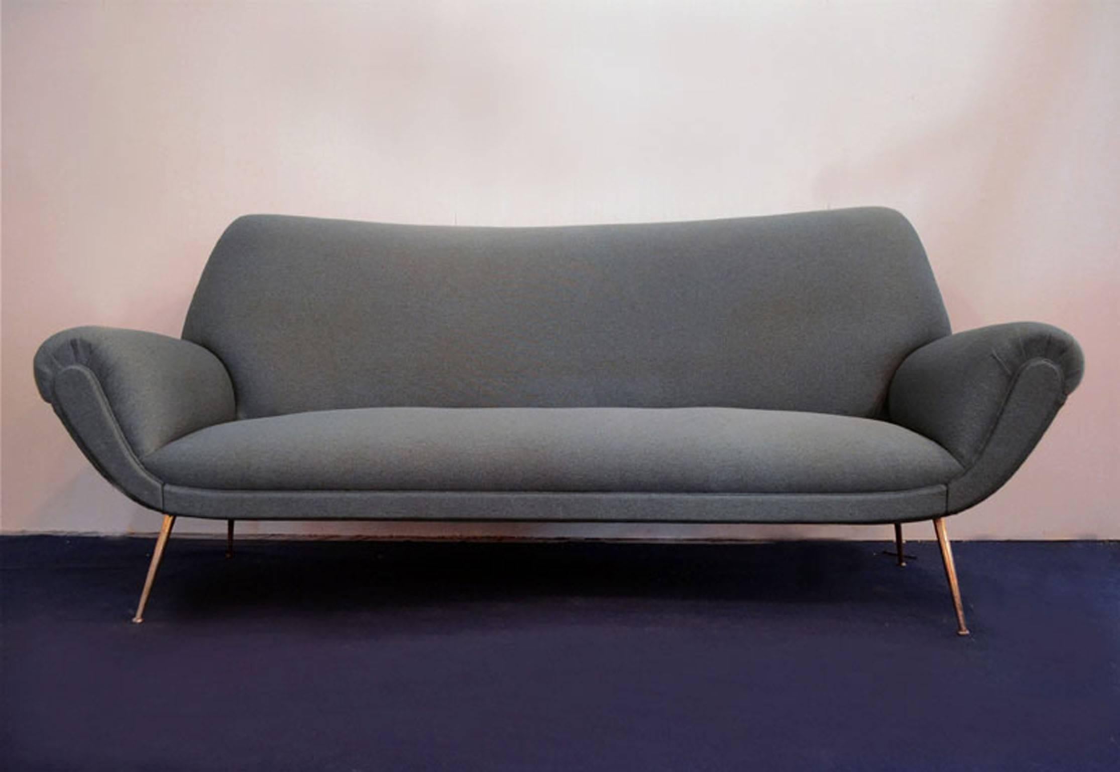 1950s sofa produced by ISA Bergamo. With particular convex back.
With perfectly restored upholstery and coverage.

                         