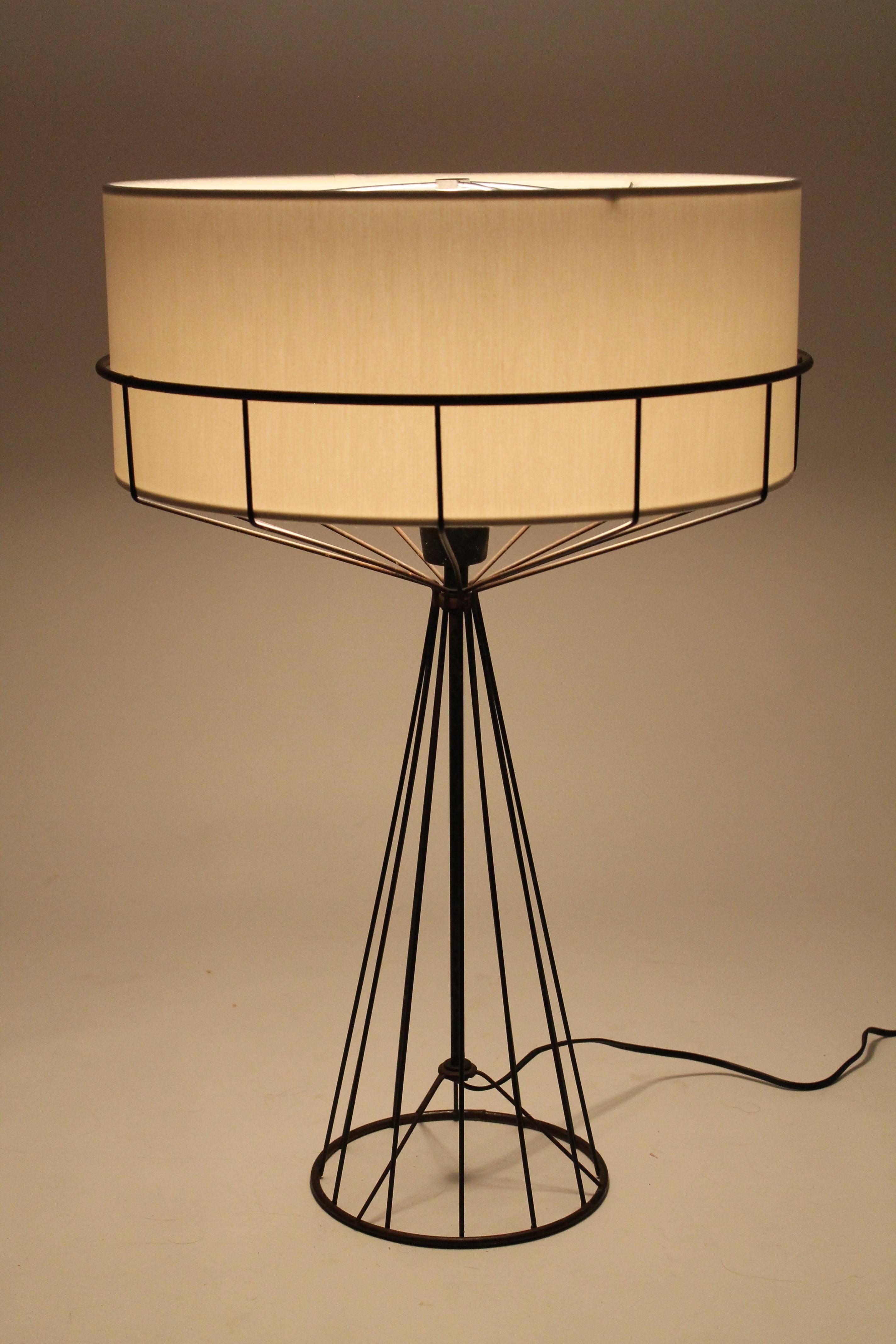 Iconic lighting art piece with a distinctive modern design , way ahead of its time for the period .  

Lamp is proposed in original as found condition, light rust and pitting on all surface, see close-up on last picture.

Lamp could be sandblasted