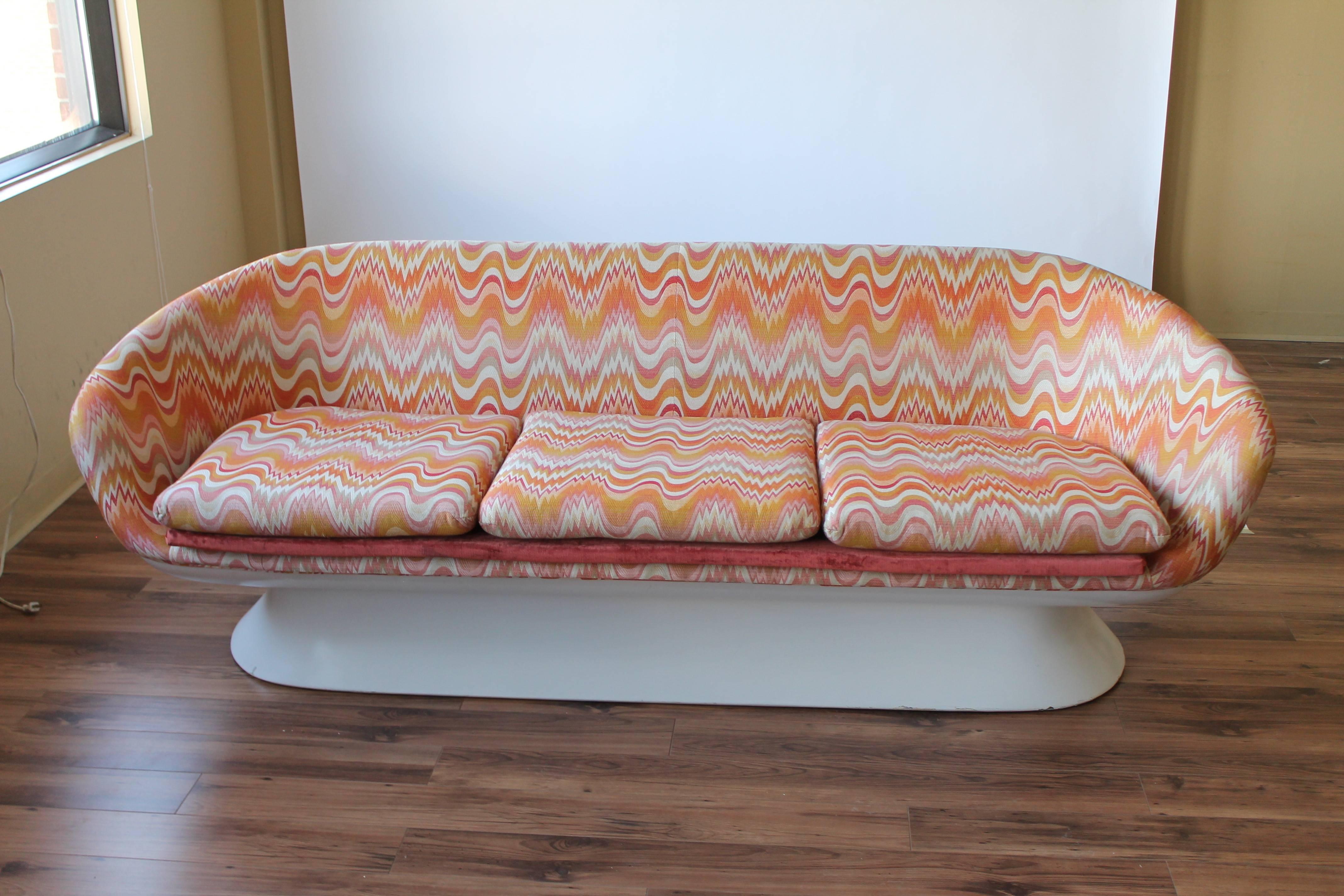 Ergonomicaly designed and very comfortable.

Base is made of enameled fiberglass.

Reupholstered  by previous owner  .

7 feet wide by 28.5 inches high .  