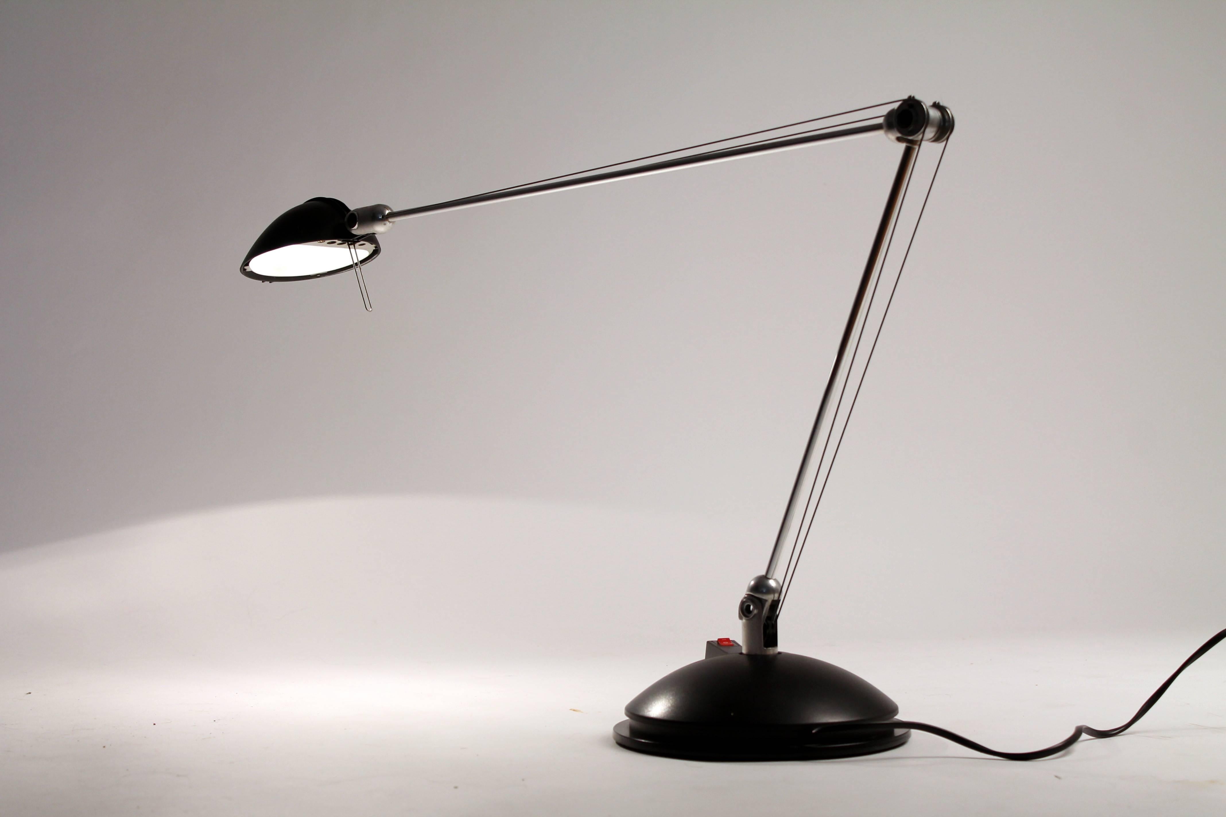 Gracious, tall, slender and agile halogen table lamp from Artemide, designed by John Bissel and Gianfranco Frattini in the 1980s.

Prime quality material and sturdy construction

Heavy casted base with a pivotal mechanism permiting easy rotation