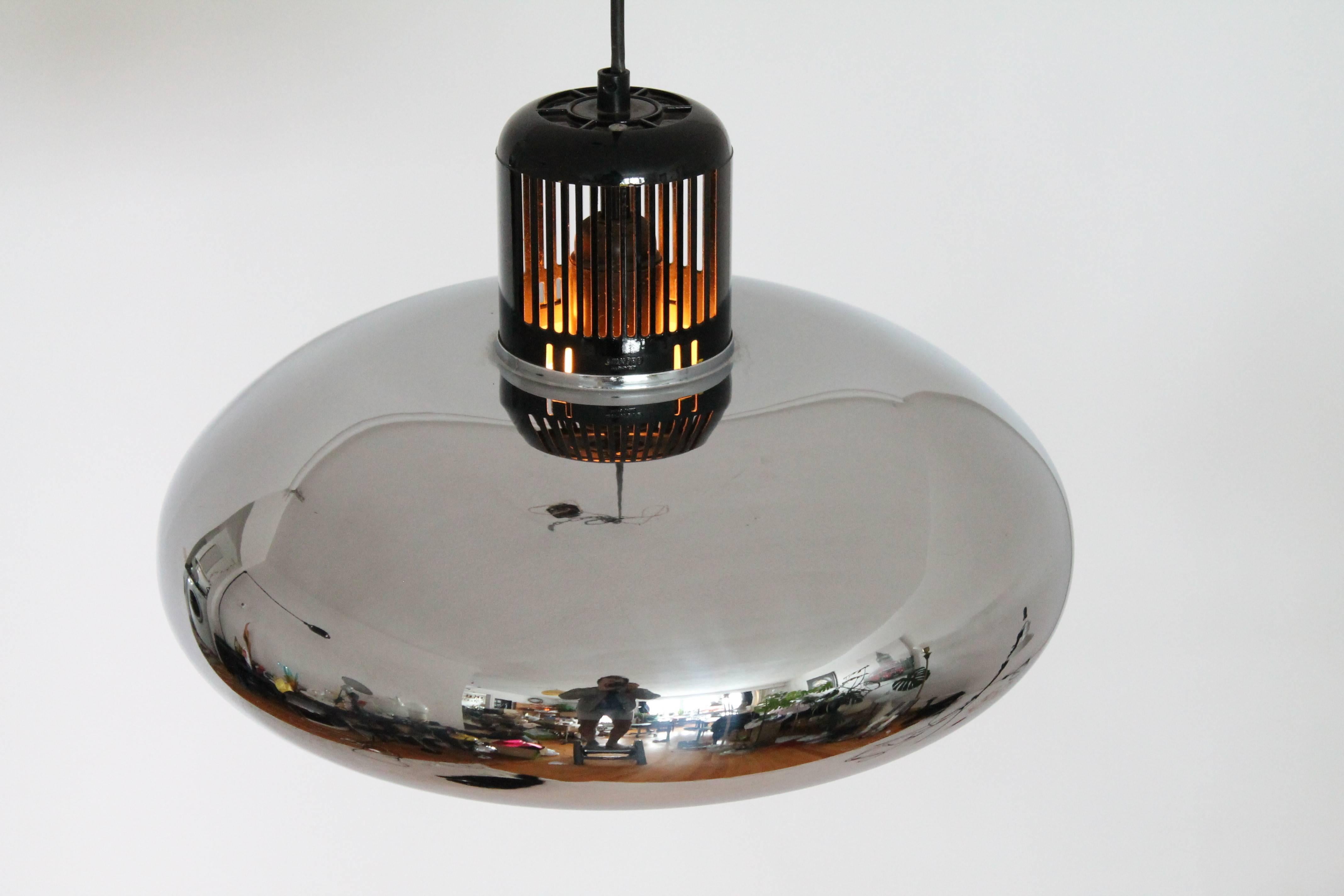 Minimalist , thick deep chrome quarter bell chandelier. 

A nicely designed bakelite vented hat top it off. 

The inside is enameled white.

Measures: 16 inches wide by 10 inches high.

Stilnovo stamped on bakelite and sticker inside.

 