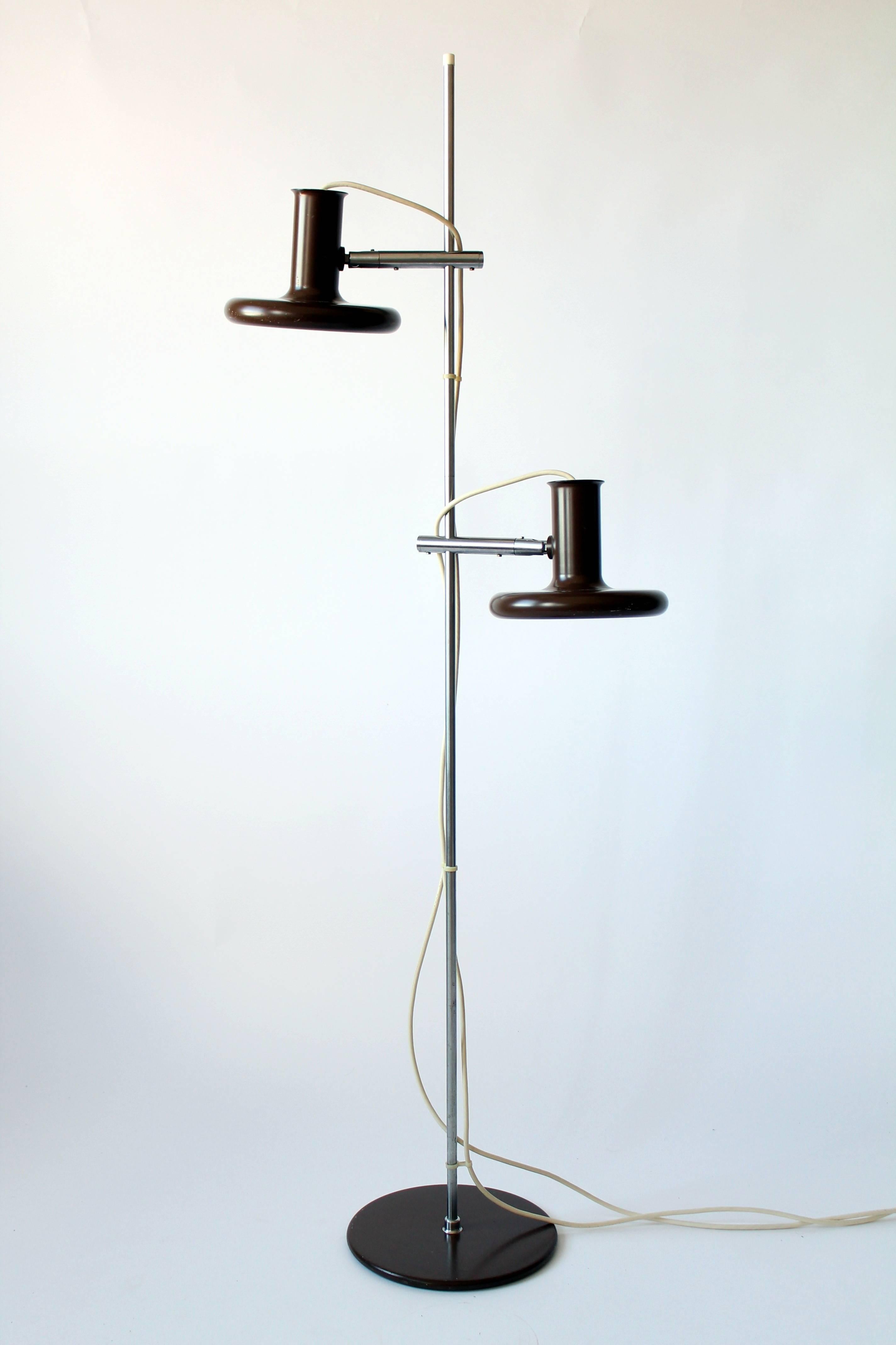 Danish iconic Minimalist floor lamp in a dark chocolate brown tone.

Shades slide up and down anywhere on chrome pole and pivot in all direction.

Well made and sturdy hardware.

Height is 56 inches, base of lamp is 10 inches wide.

Ceramic